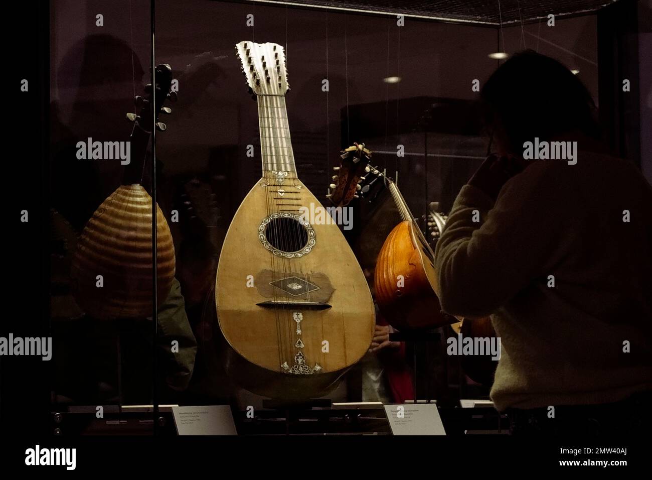 Berlin, Germany. 01st Feb, 2023. Visitors view mandolins in an
