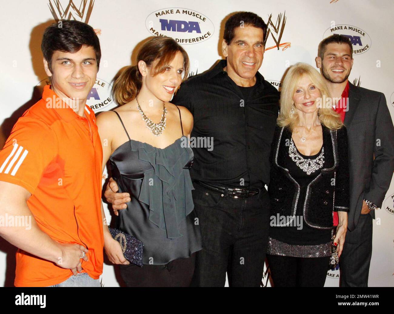 Lou Ferrigno and his family Brent, Shanna, Carla and Louis Jr. pose on the red carpet at the annual WWE SummerSlam kickoff party in association with the Muscular Dystrophy Association held at the Tropicana Bar inside the Hollywood Roosevelt Hotel. Los Angeles, CA. 08/13/10. Stock Photo
