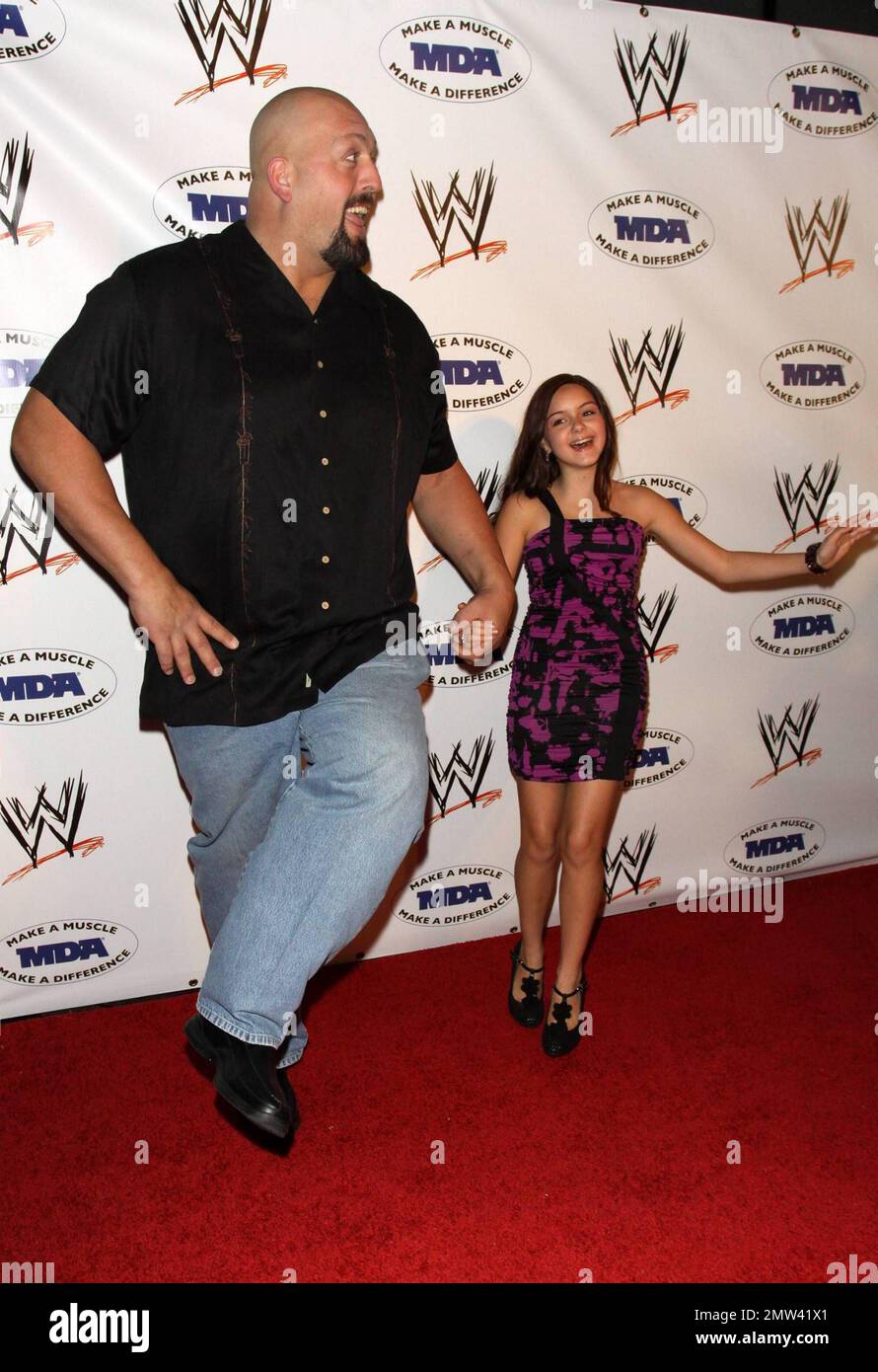 Big Show (aka Paul Wight) and Ariel Winter make a size comparison on the  red carpet at the annual WWE SummerSlam kickoff party in association with  the Muscular Dystrophy Association held at