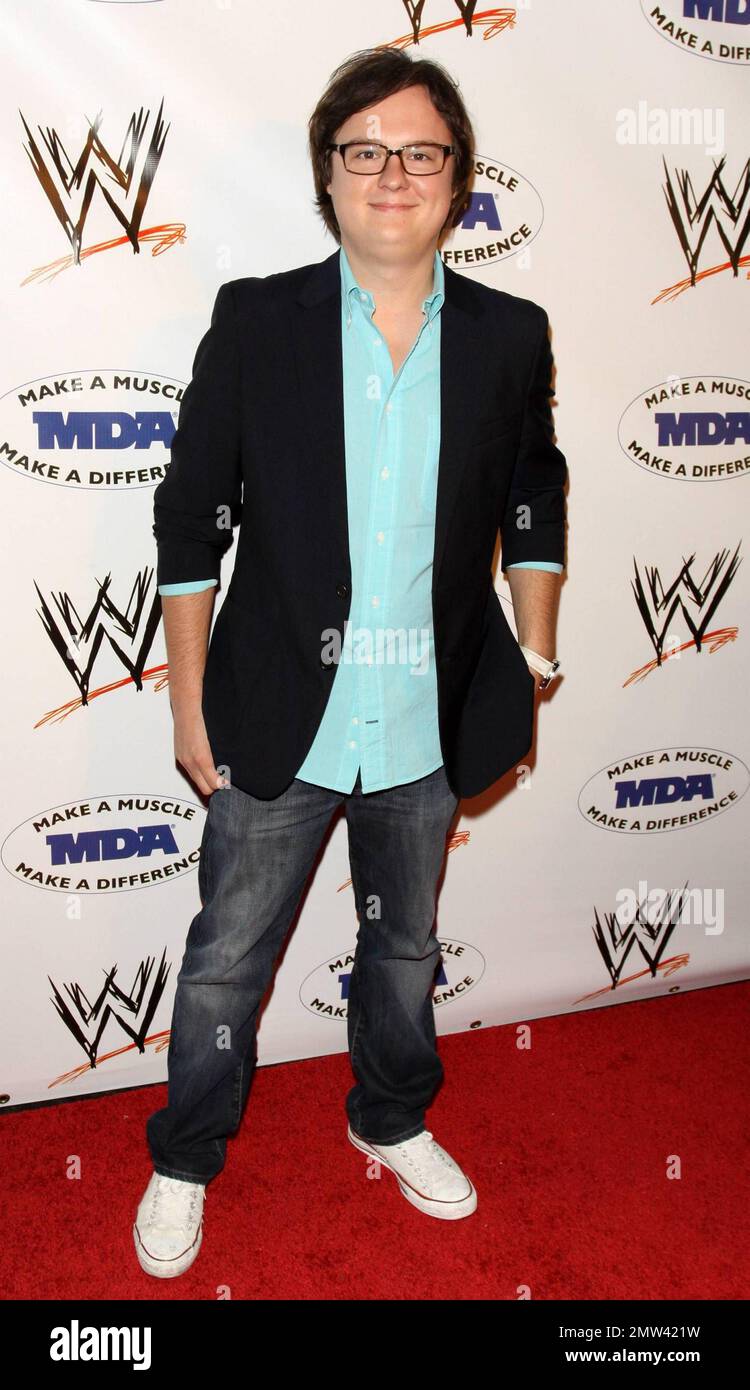 Clark Duke poses on the red carpet at the annual WWE SummerSlam kickoff