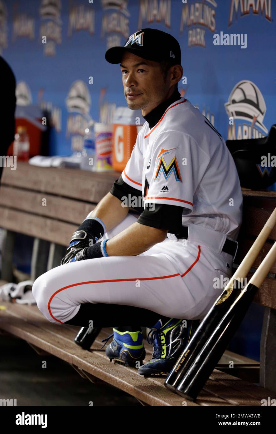 Miami Marlins right fielder Ichiro Suzuki, of Japan, sits in the