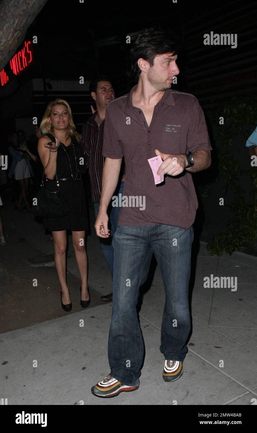 Scrubs" star Zach Braff signs autographs outside the nightclub Guys and  Dolls in Los Angeles, CA. 5/15/09 Stock Photo - Alamy