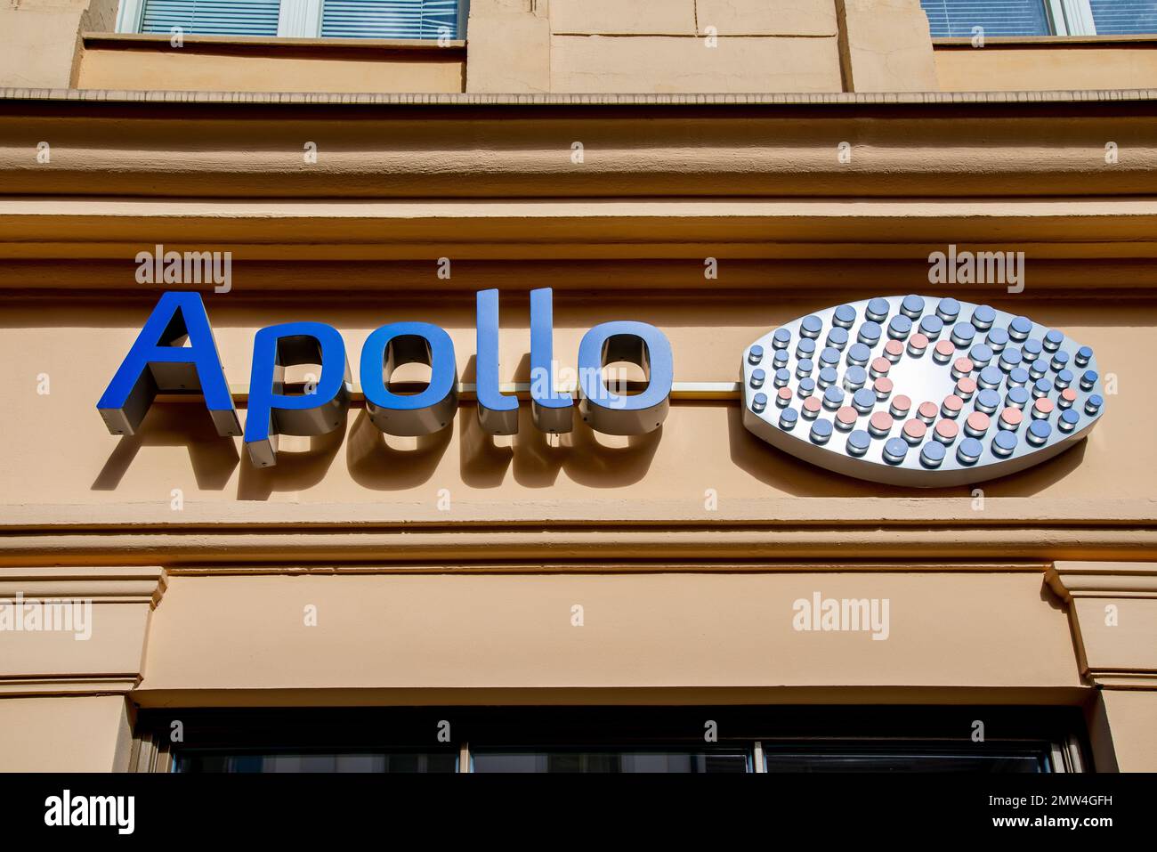 The shop sign of an optician named Apollo in Potsdam on a house wall in ...