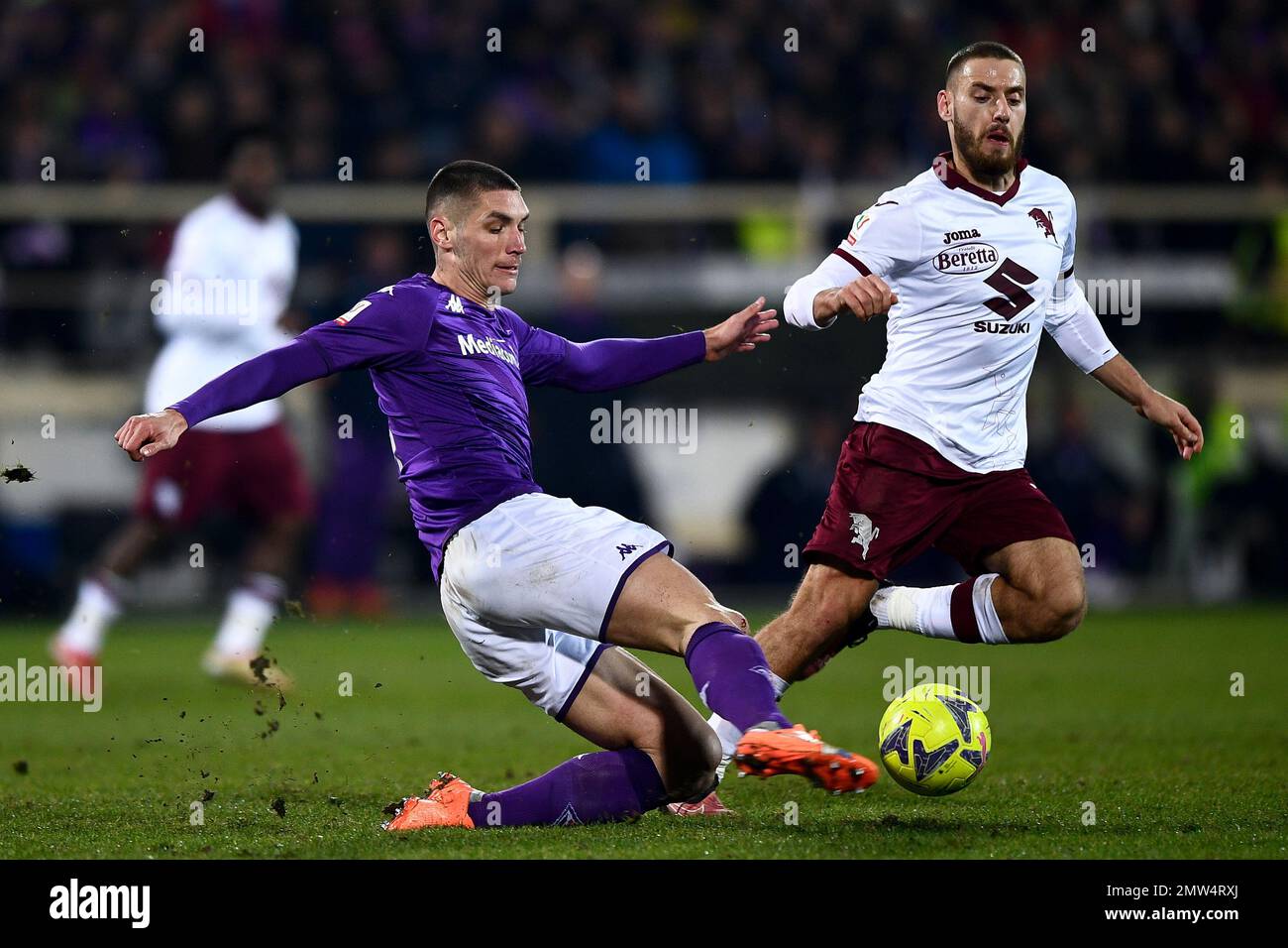 Florence, Italy. 21st May, 2022. Moise Kean of Juventus FC and Nikola  Milenkovic of ACF Fiorentina compete for the ball during the Serie A  2021/2022 football match between ACF Fiorentina and Juventus