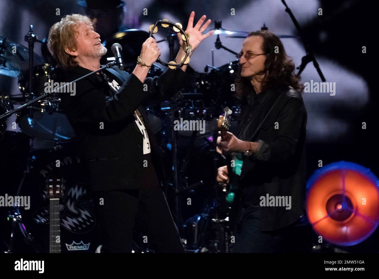 Inductee Jon Anderson from the band Yes, left, and Geddy Lee from the