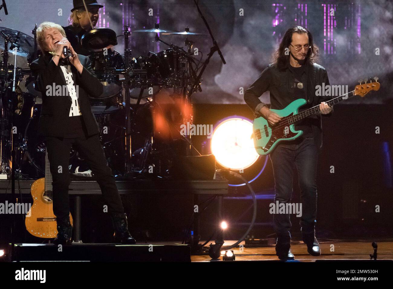 Inductee Jon Anderson from the band Yes, left, and Geddy Lee from the