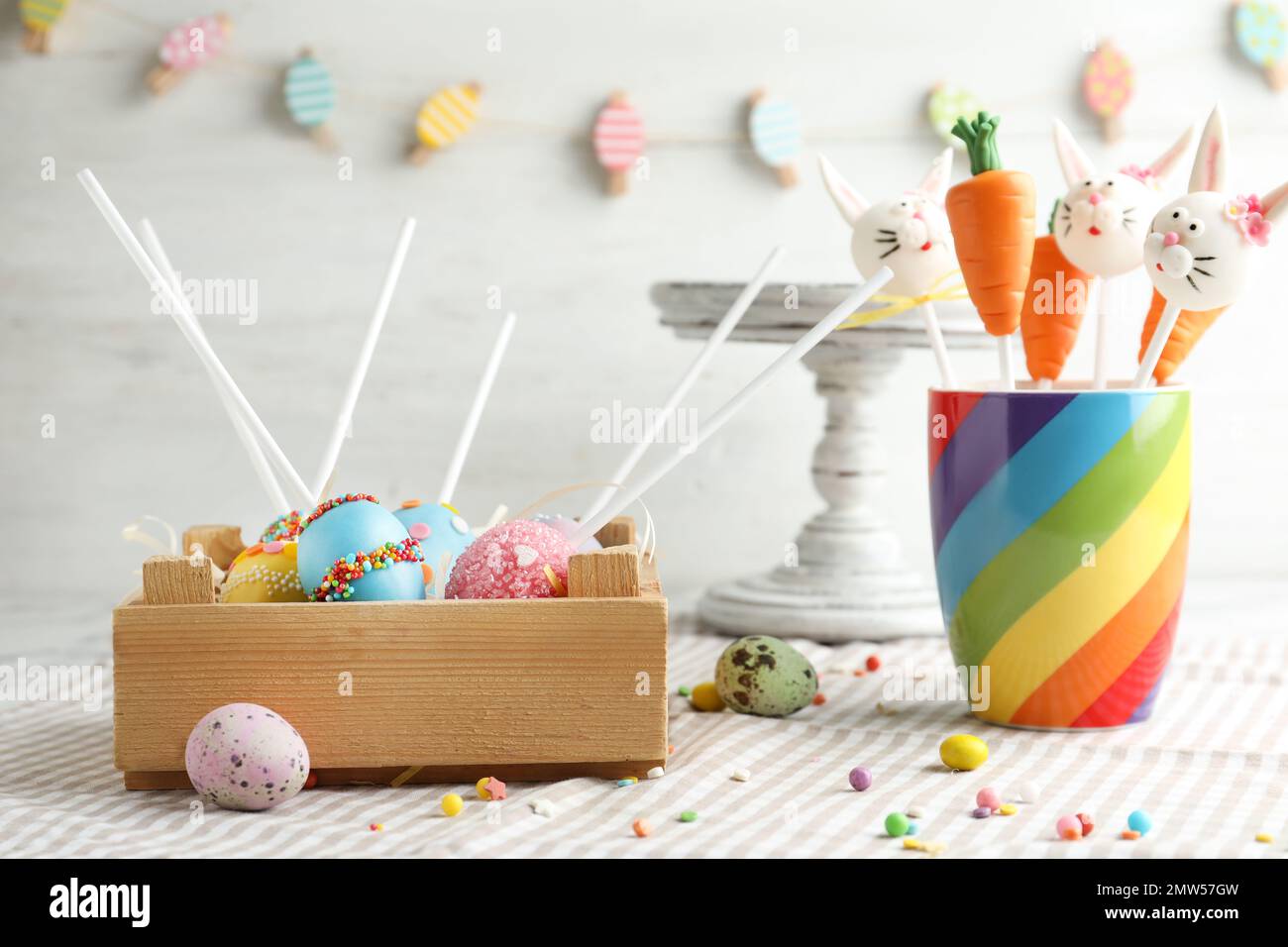 Different delicious sweet cake pops on table. Easter holiday Stock Photo