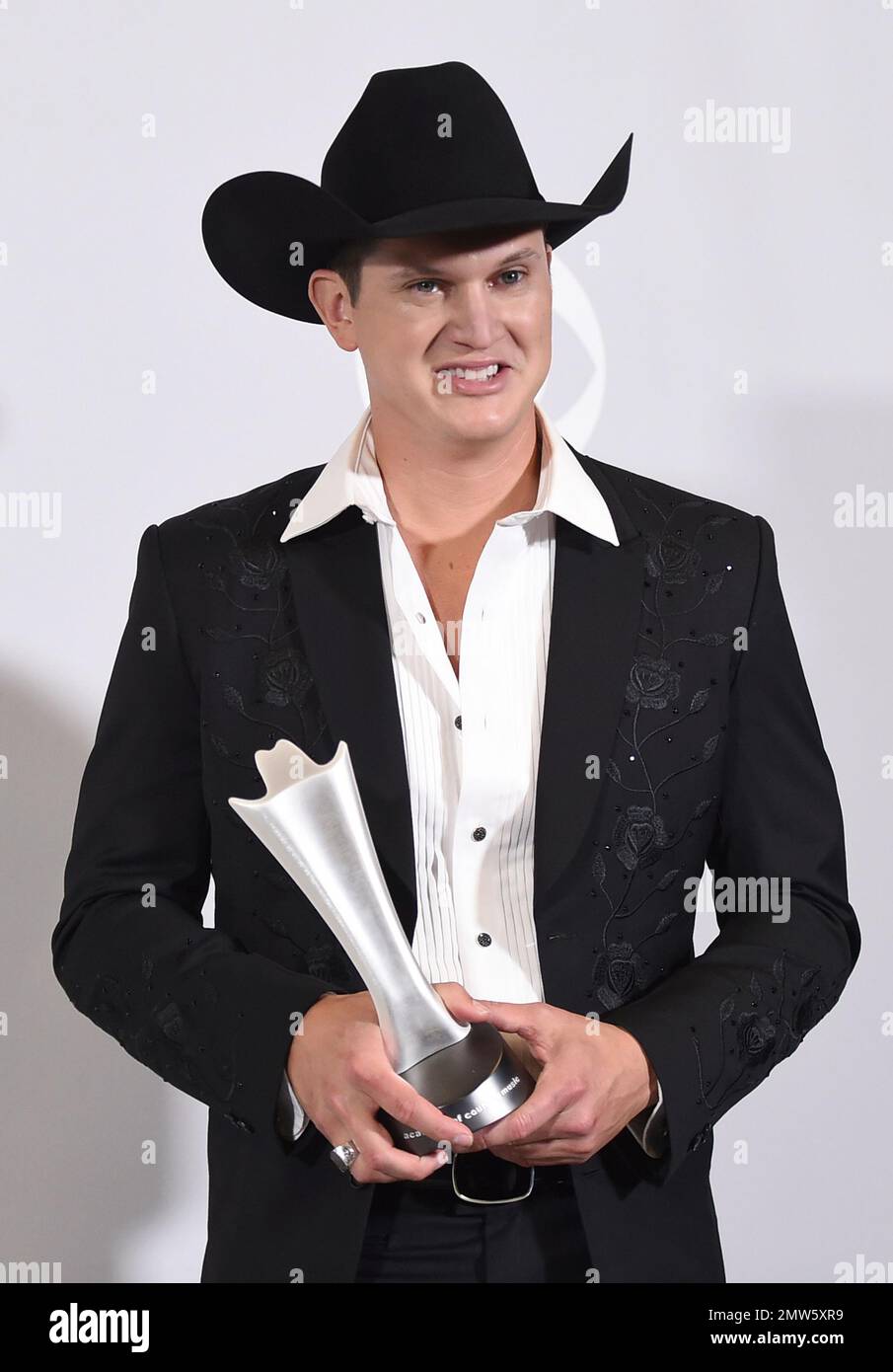 Jon Pardi poses in the press room with the award for new male vocalist