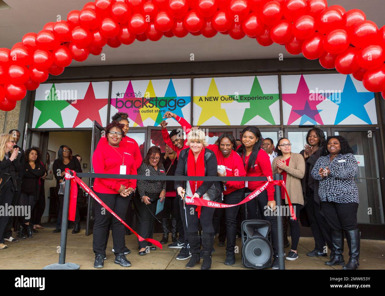IMAGE DISTRIBUTED FOR MACY'S Store Manager Lynda Albright cuts the