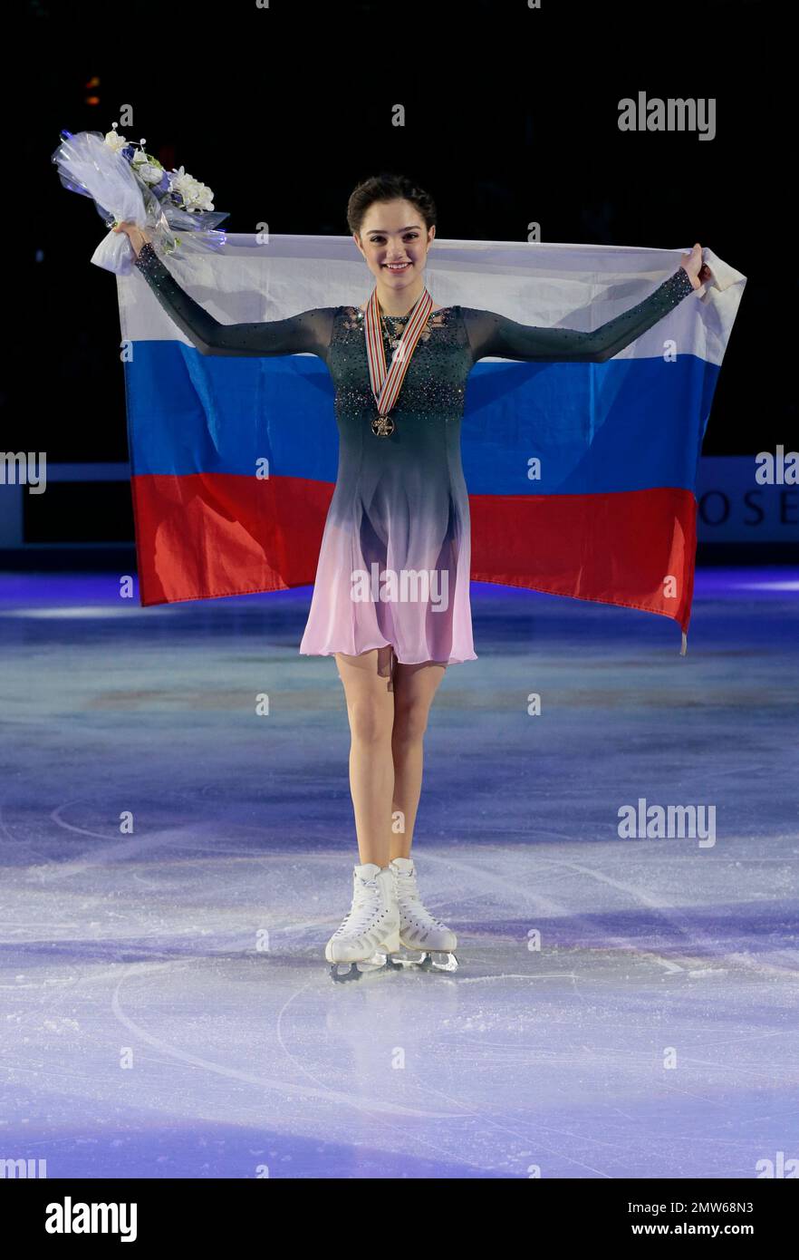 Evgenia Medvedeva, of Russia, poses with her gold medal and the
