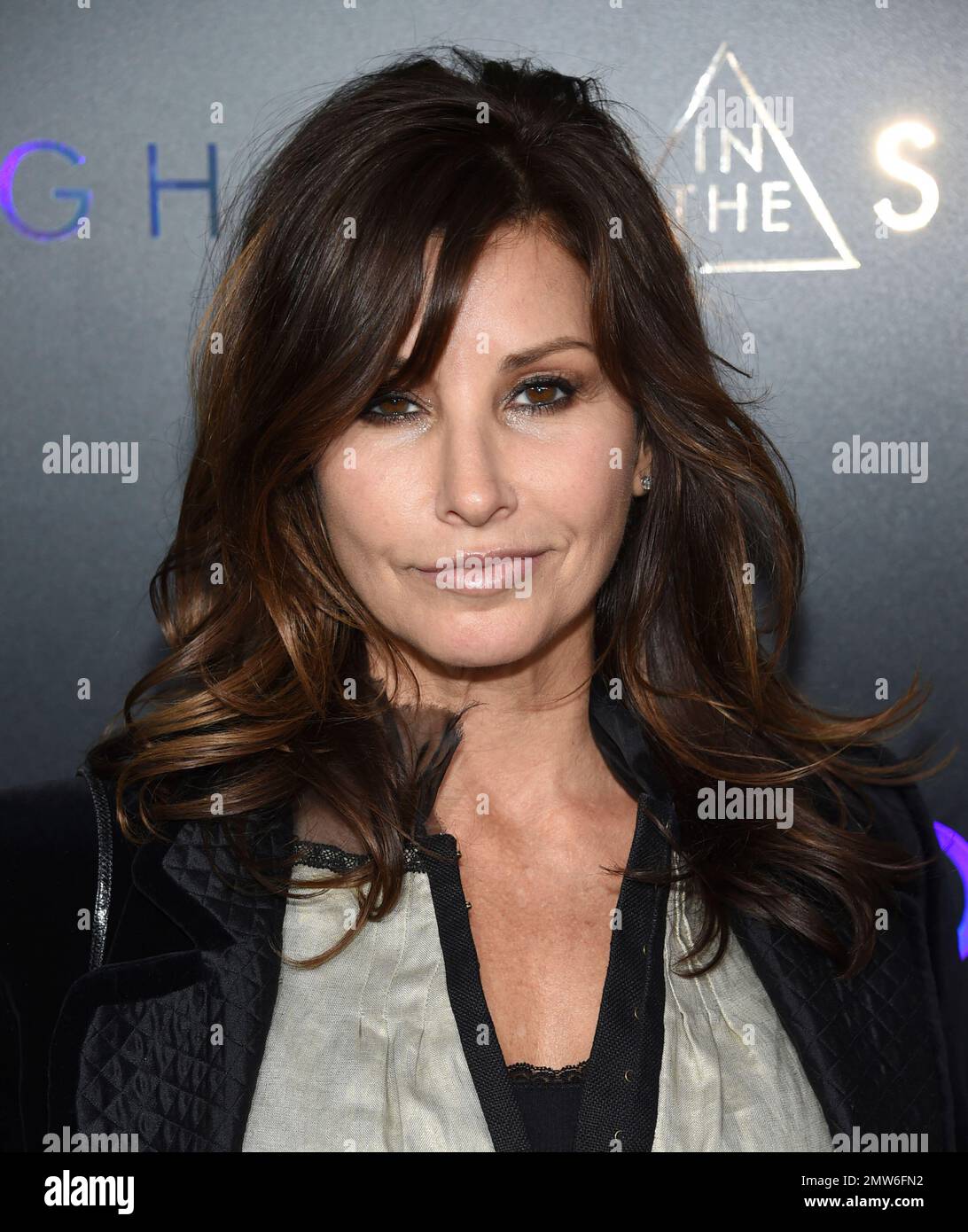 Gina Gershon attends the premiere of "Ghost in the Shell" at AMC Loews