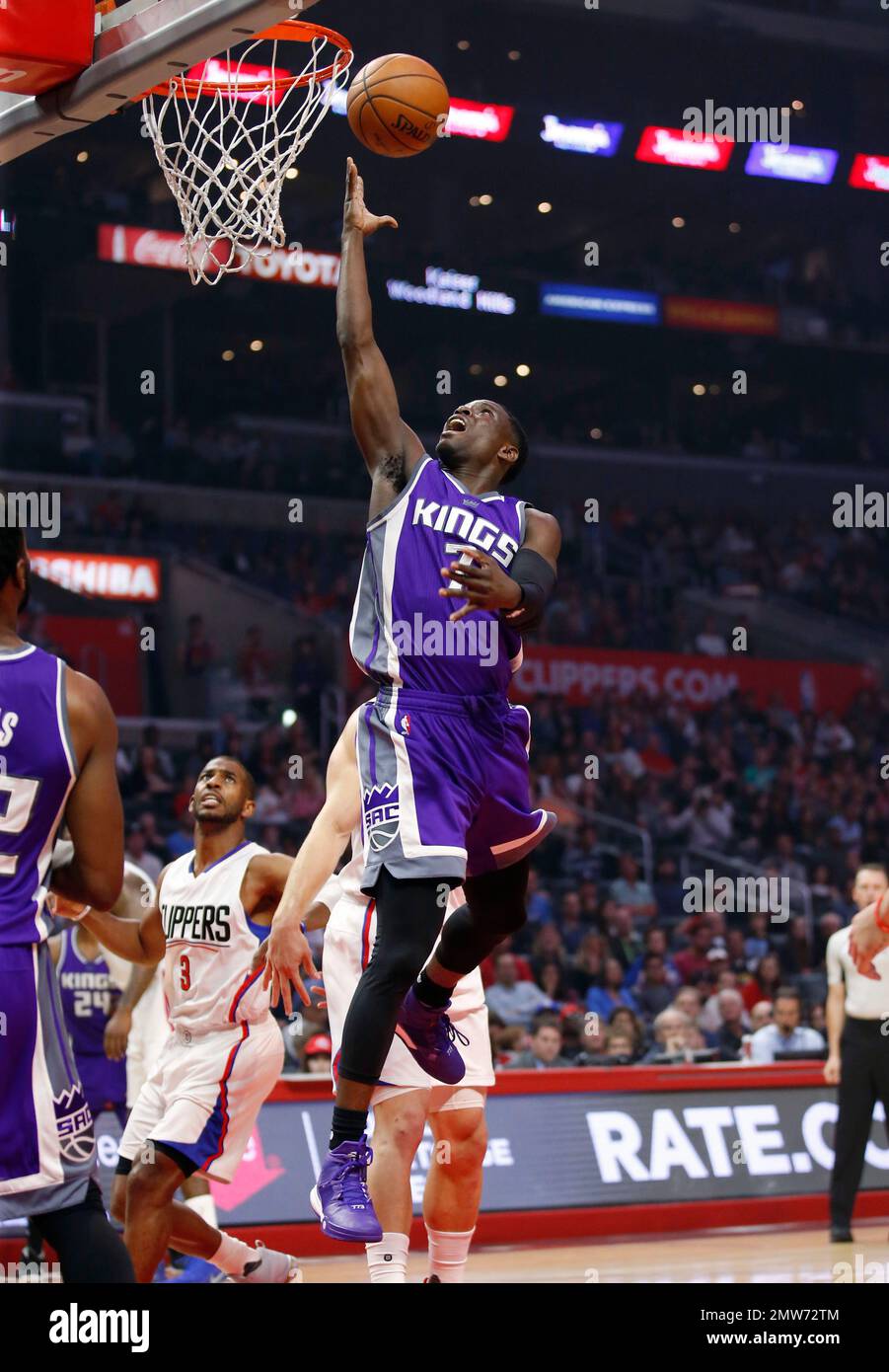 Sacramento Kings guard Darren Collison scores in front of Los Angeles