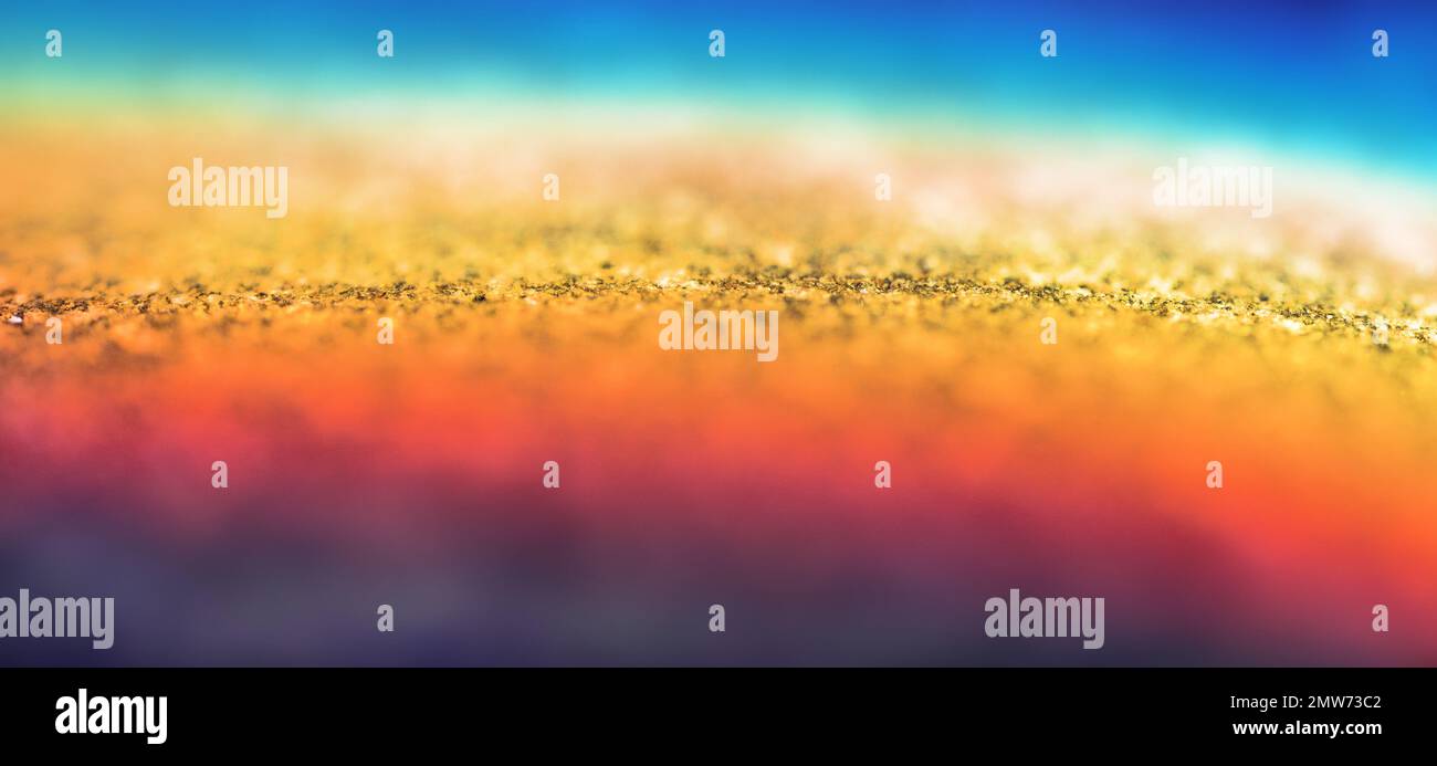Stone surface in rainbow spectrum. Ultra Macro Stock Photo