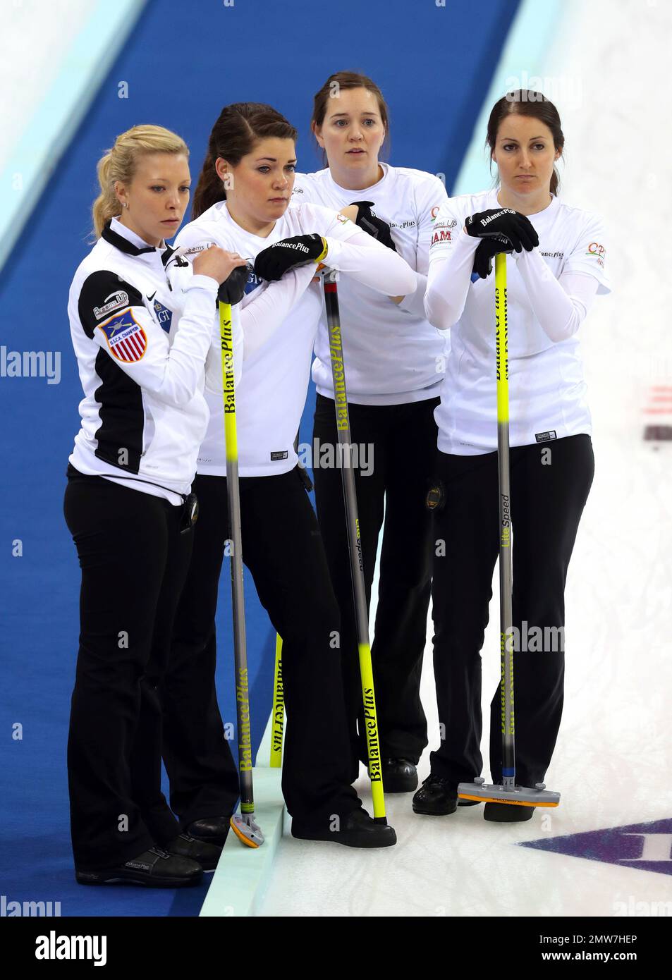 Members of the United States team, from left, Nina Roth, Becca Hamilton, Aileen Geving, and Tabitha Peterson watch the action during their match against Switzerland in the CPT World Womens Curling Championship