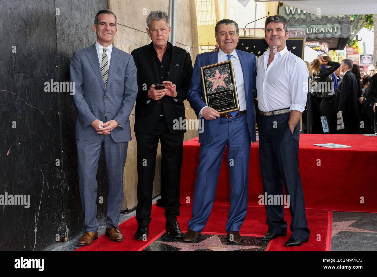 Los Angeles Mayor Eric Garcetti, from left, music producer David Foster