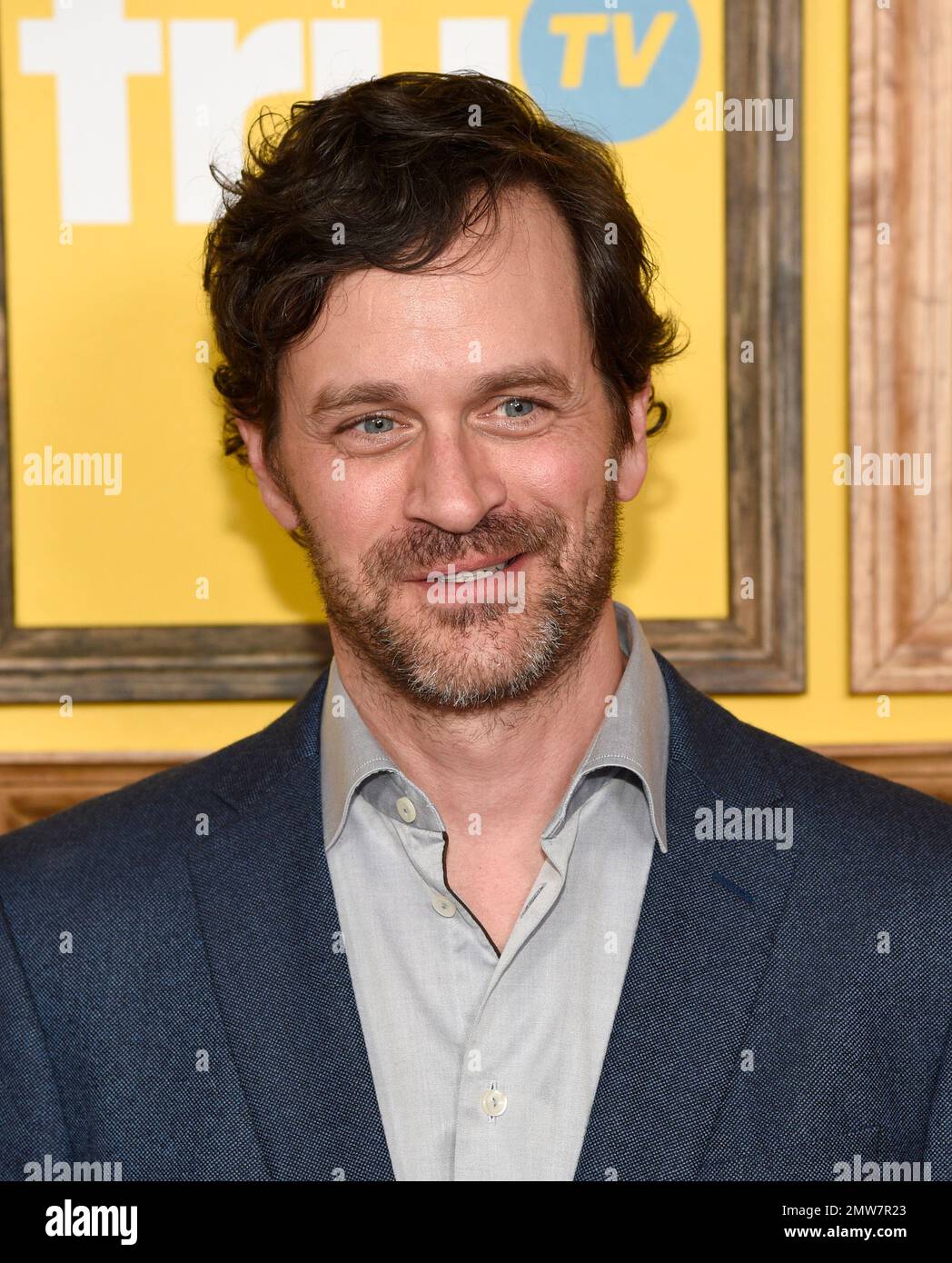 Tom Everett Scott arrives at a premiere for "Upscale with Prentice