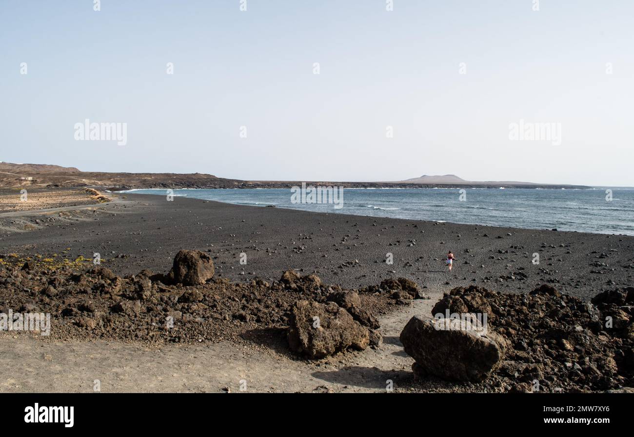 Panorama of the black beach in Lanzarote. Incredible and impressive ...