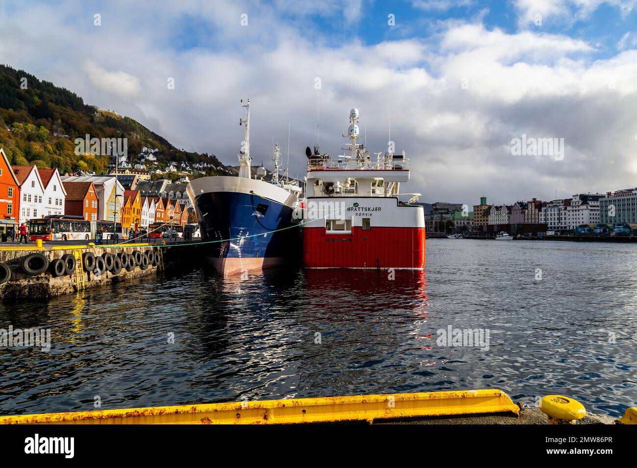 Fishing vessels Ketlin and Brattskjaer (Brattskjær) at the historic Bryggen quay, in the port of Bergen, Norway. Stock Photo