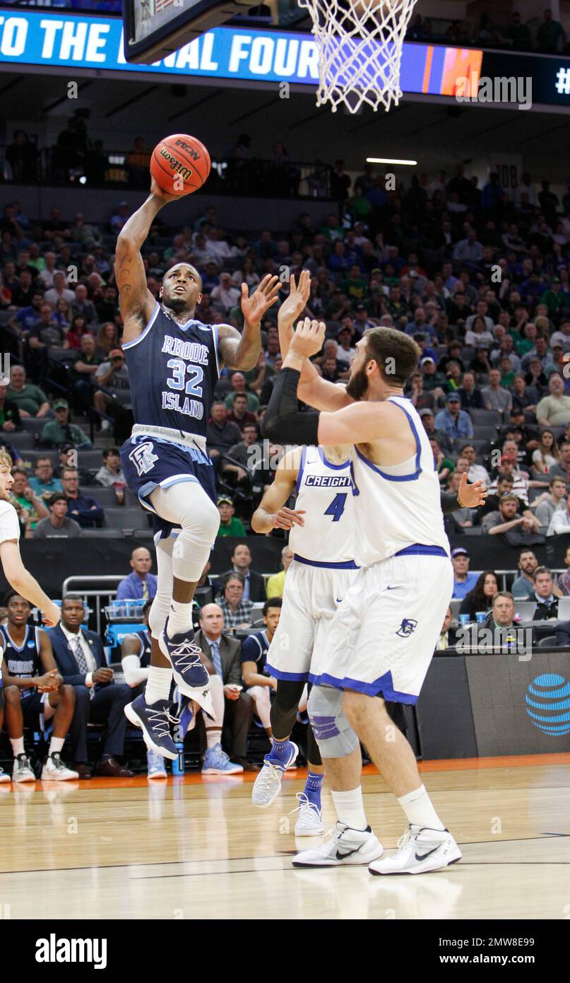 Rhode Island guard Jared Terrell (32) shoots over Creighton defenders