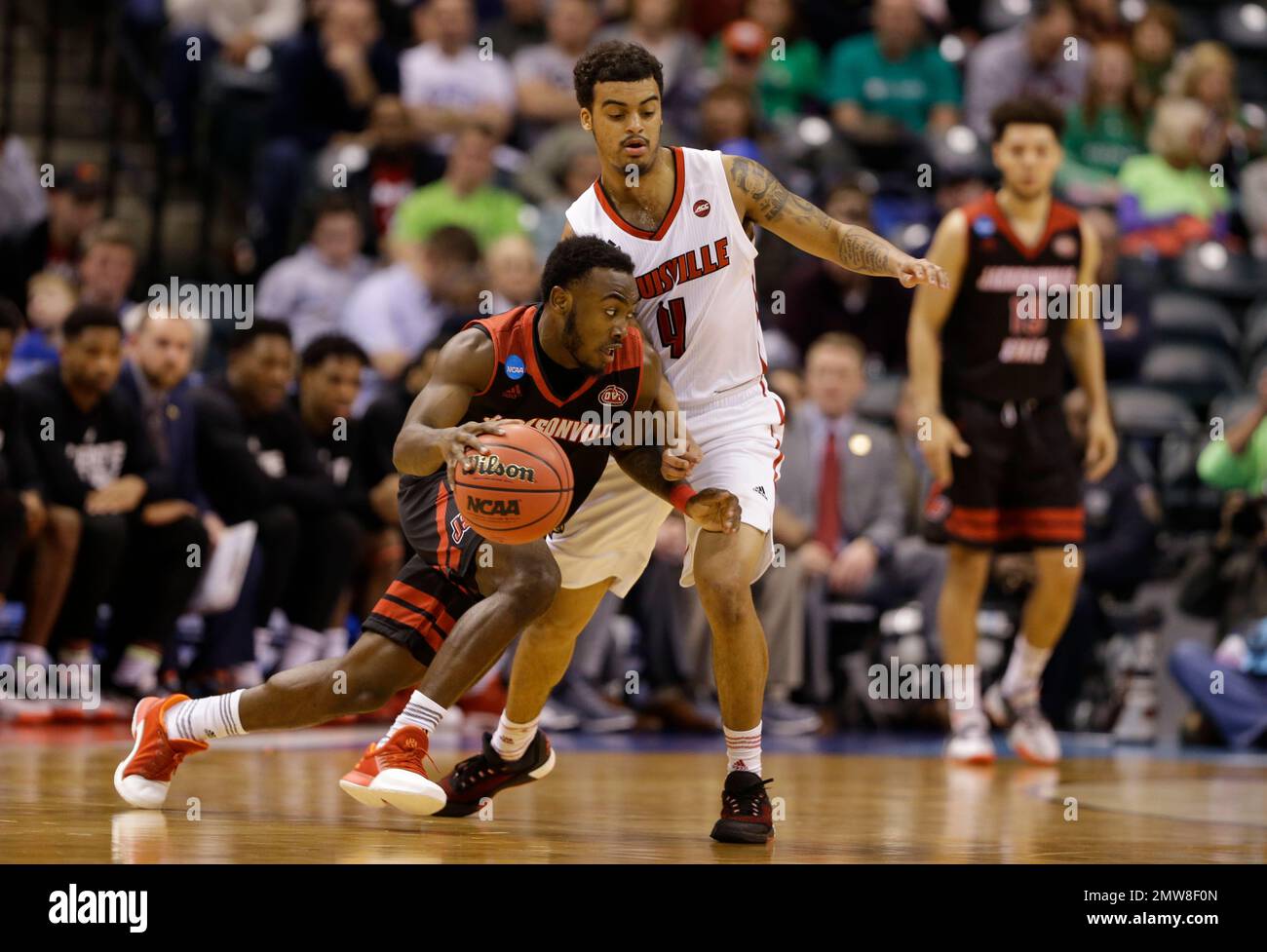 Jacksonville State guard Tyrik Edwards (4) drives on Louisville guard