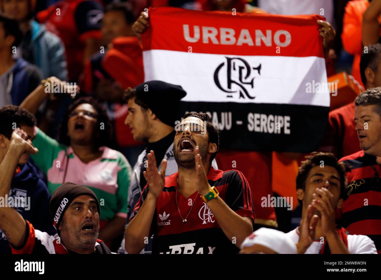 Fans of Brazil's Flamengo soccer team sing before a Copa Libertadores