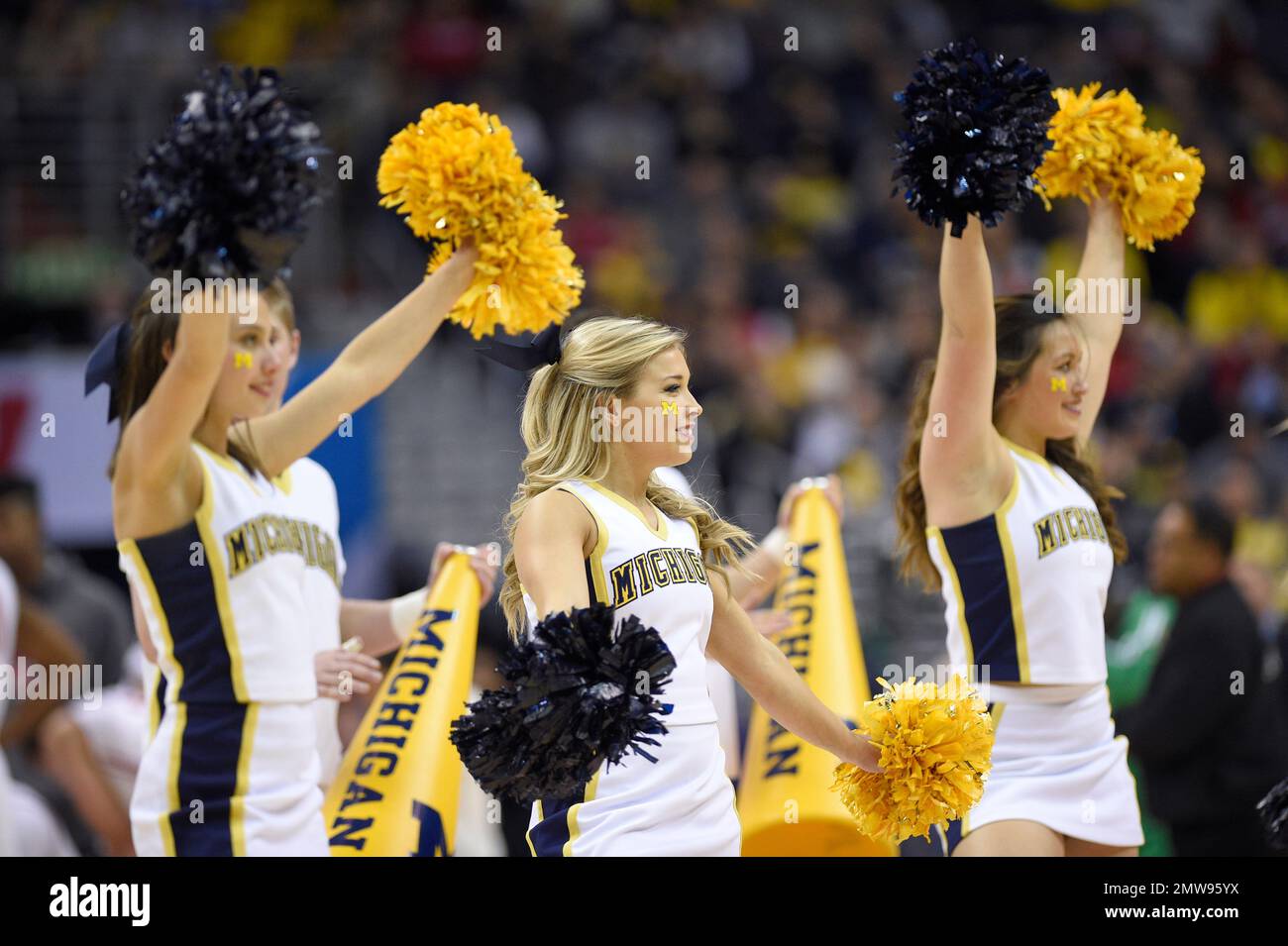 Michigan cheerleaders perform during the first half of the Big Ten NCAA