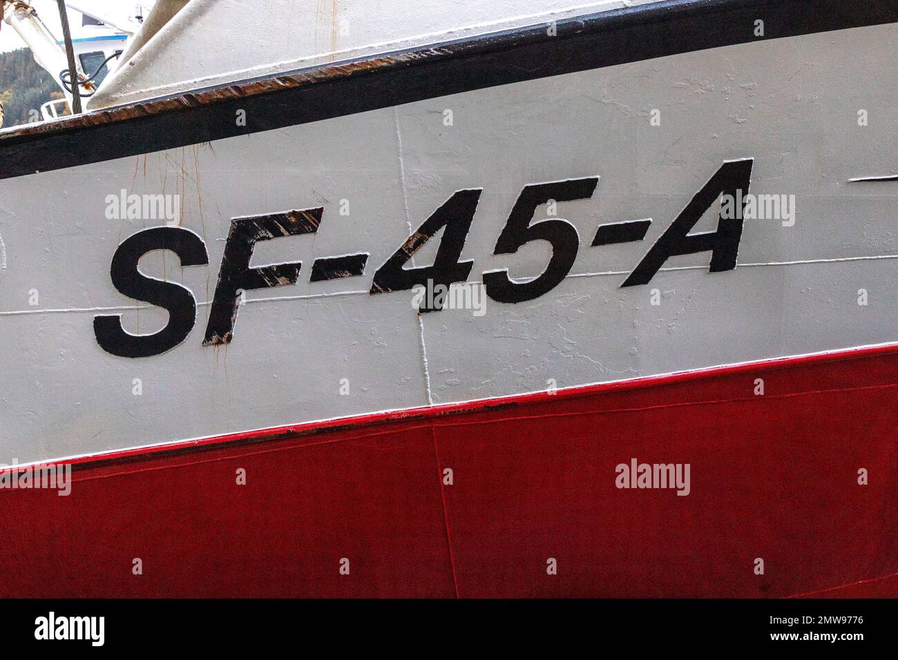 Marking and details of fishing vessel Buefjord at quay, in the port of