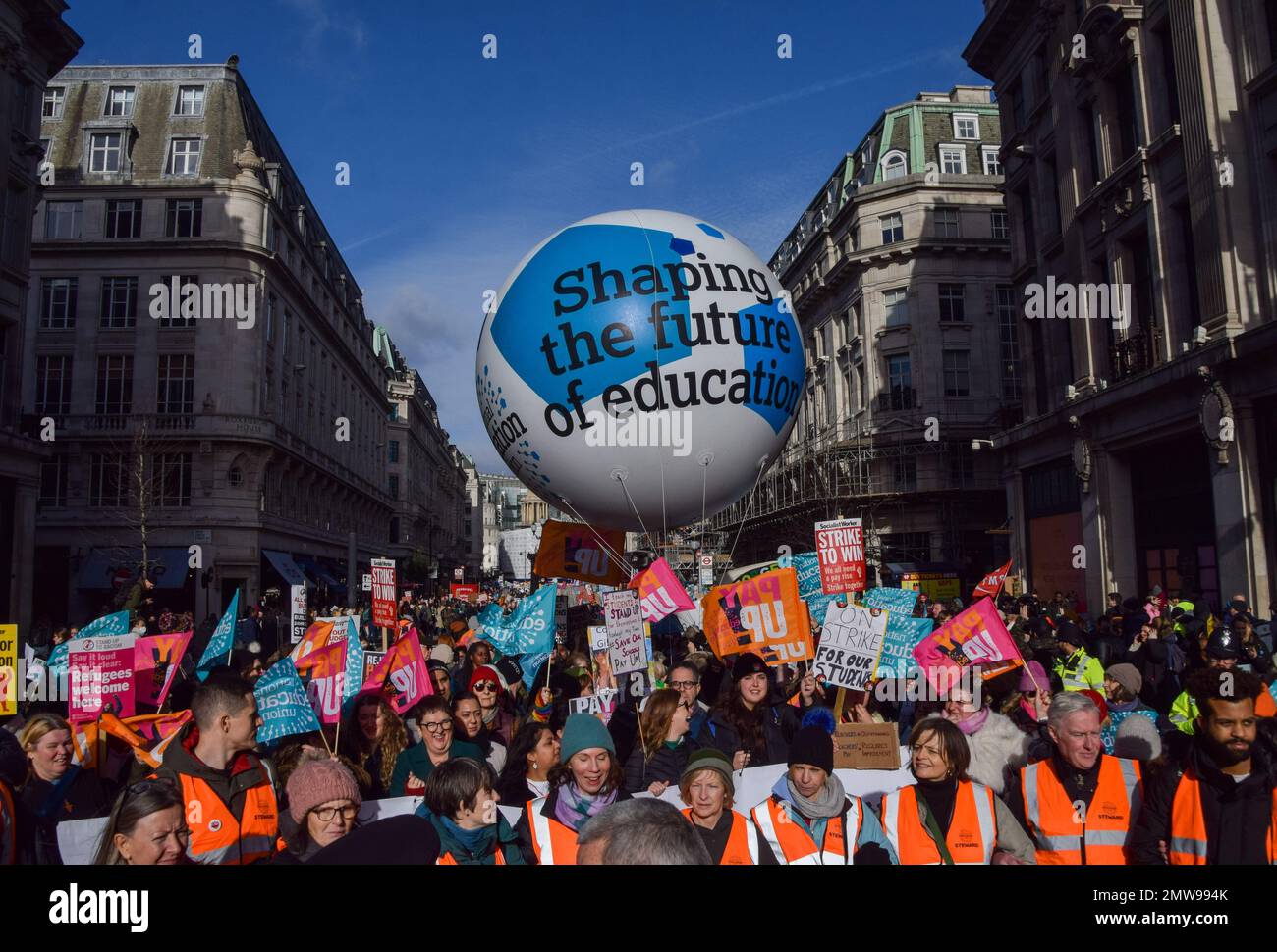 London, UK. 1st February 2023. Protesters in Regent Street. Thousands of teachers and supporters marched in central London as teachers across the country begin their strike over pay. The day has seen around half a million people staging walkouts around the UK, incuding teachers, university staff, public service workers and train drivers. Stock Photo