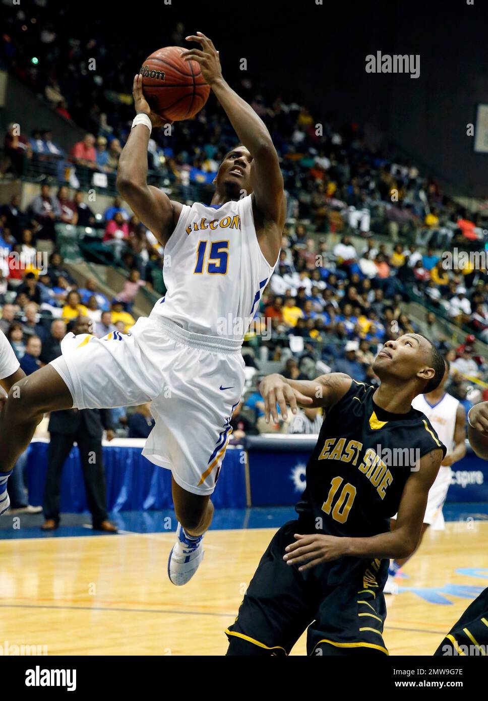Velma Jackson's Nikolas Weatherspoon (15) attempts a layup while East