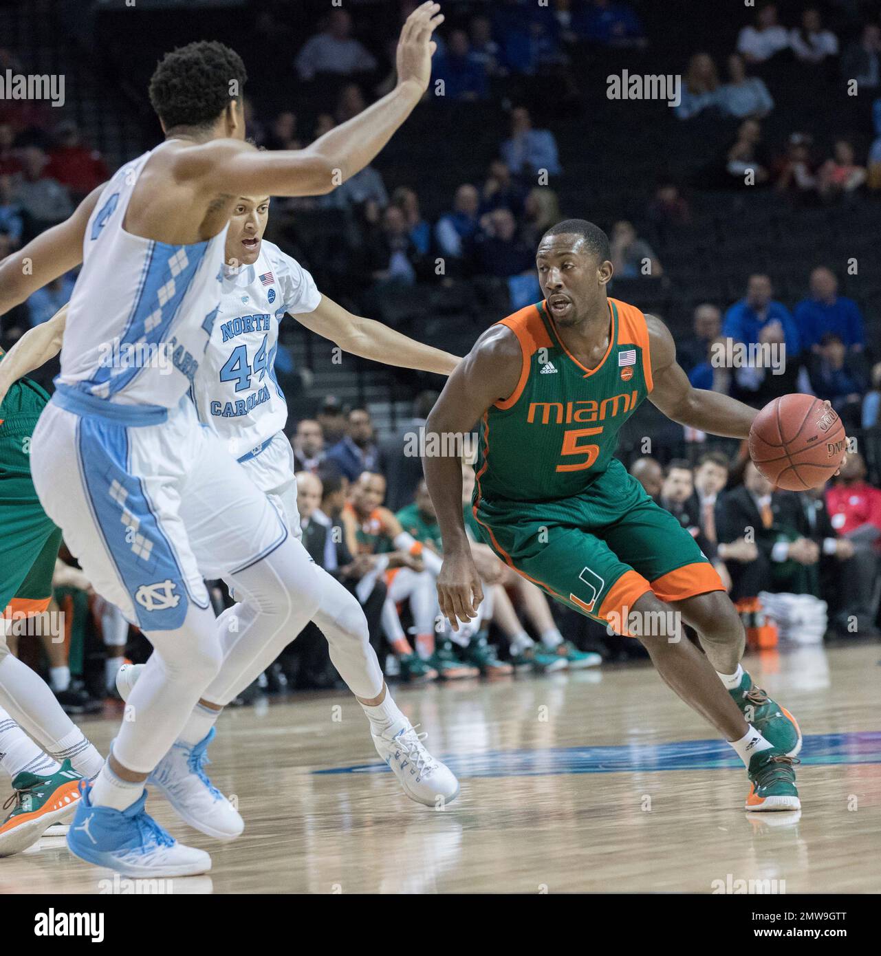 Miami guard Davon Reed (5) drives to the basket against North Carolina ...