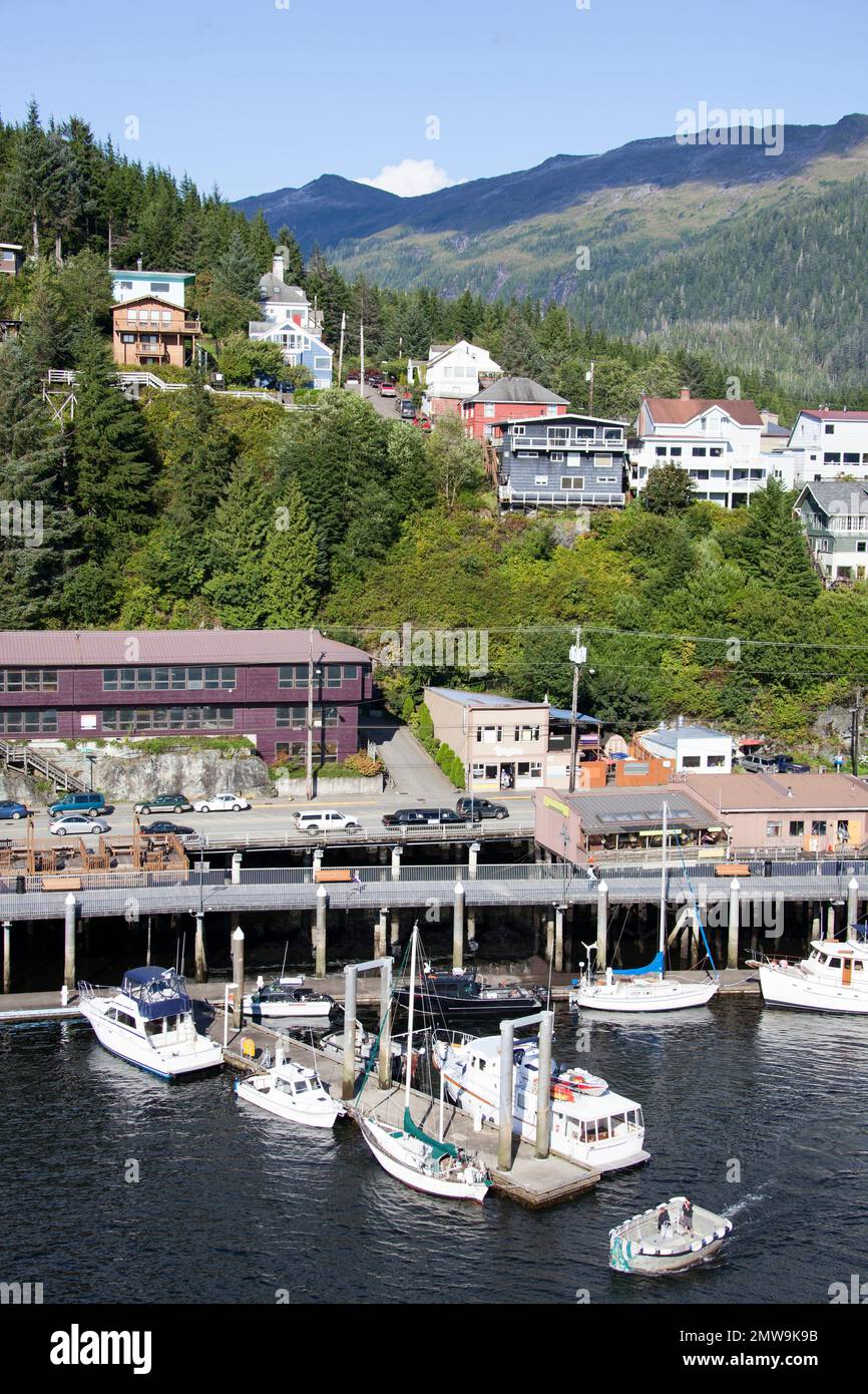 The aerial view of different boats and houses on a main street in Ketchikan town (Alaska). Stock Photo
