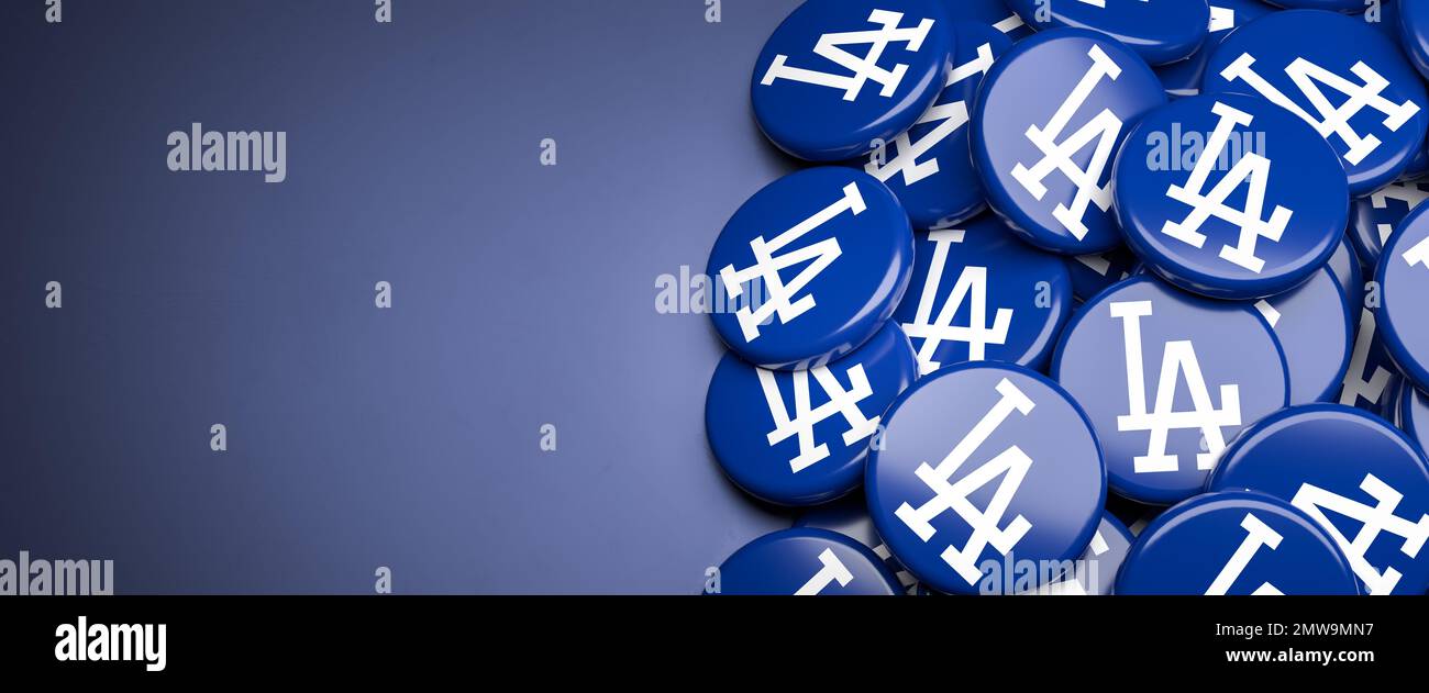 Logos of the American Major League Baseball Team Los Angeles Dodgers on a heap on a table. Stock Photo