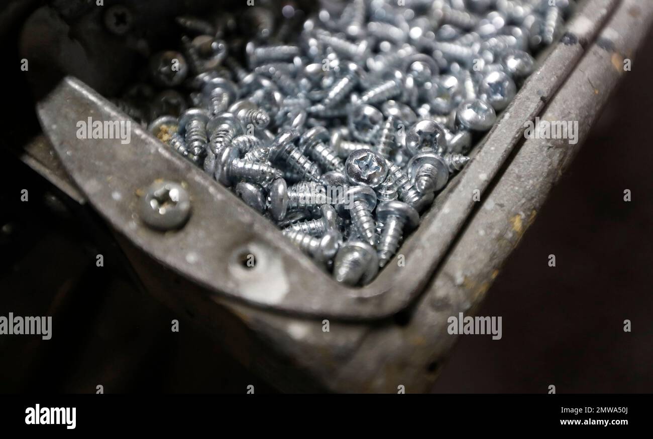 In this Jan. 17, 2017, photo, machine screws are seen in a bin at Corn