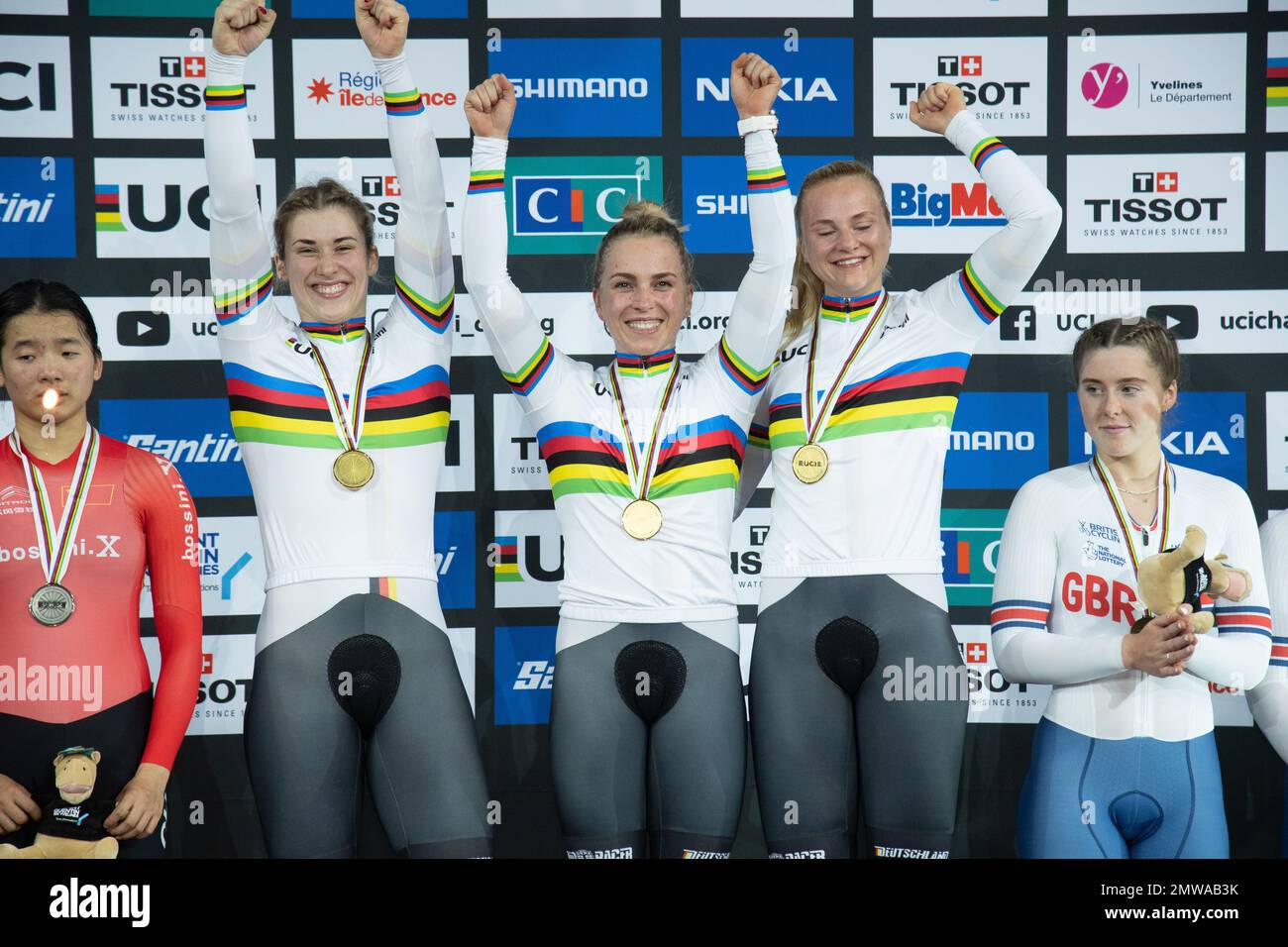 The German women's team sprint world champions on the podium with their gold medals. Pauline Grabosch(L), Emma Hinze, and Lea Sophie Friedrich(R). Stock Photo