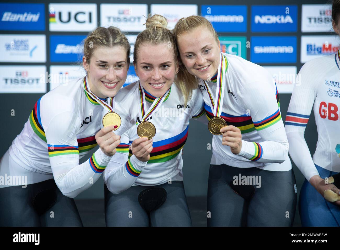 The German women's team sprint world champions on the podium with their gold medals. Pauline Grabosch(L), Emma Hinze, and Lea Sophie Friedrich(R). Stock Photo
