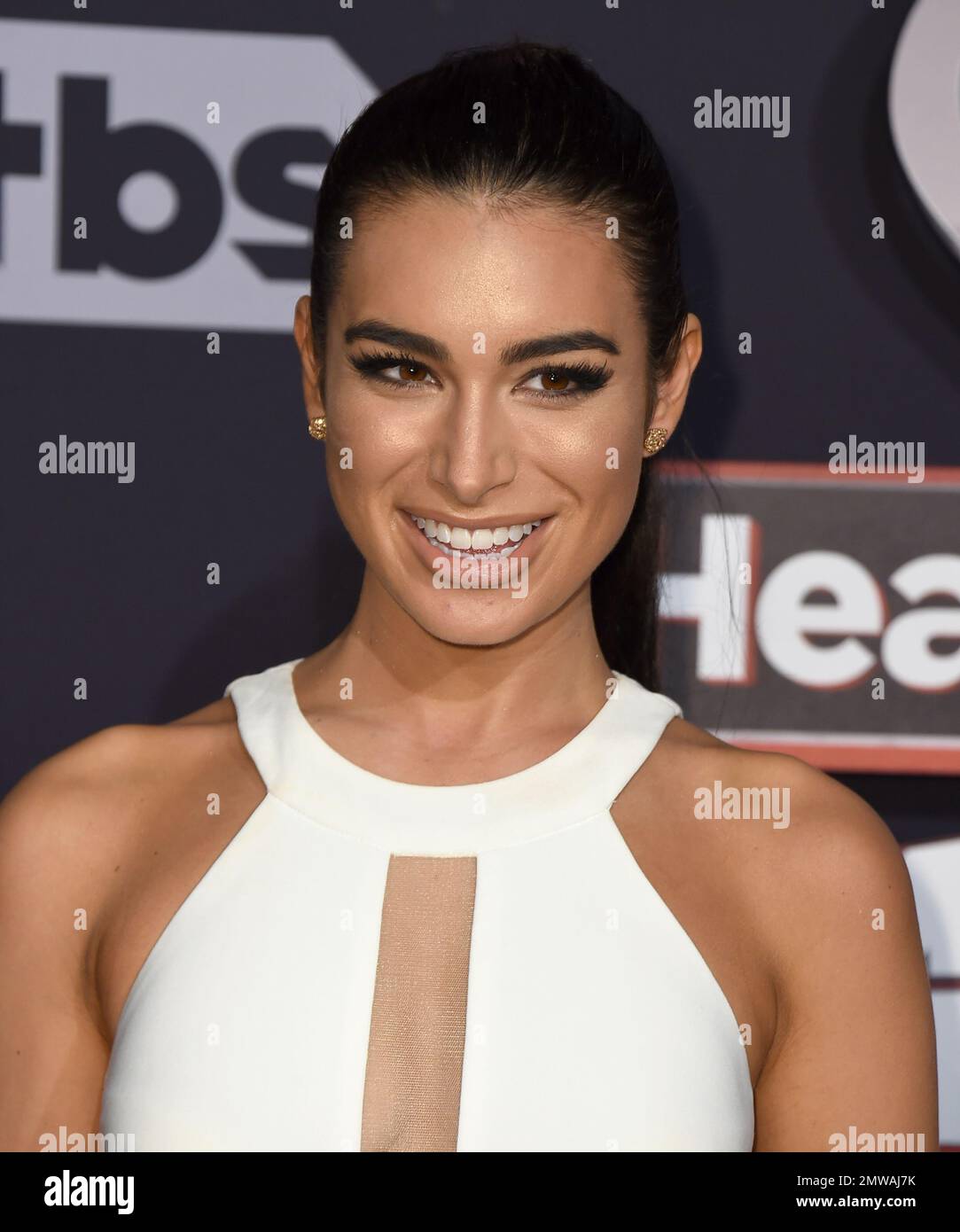 Ashley Iaconetti arrives at the iHeartRadio Music Awards at the Forum