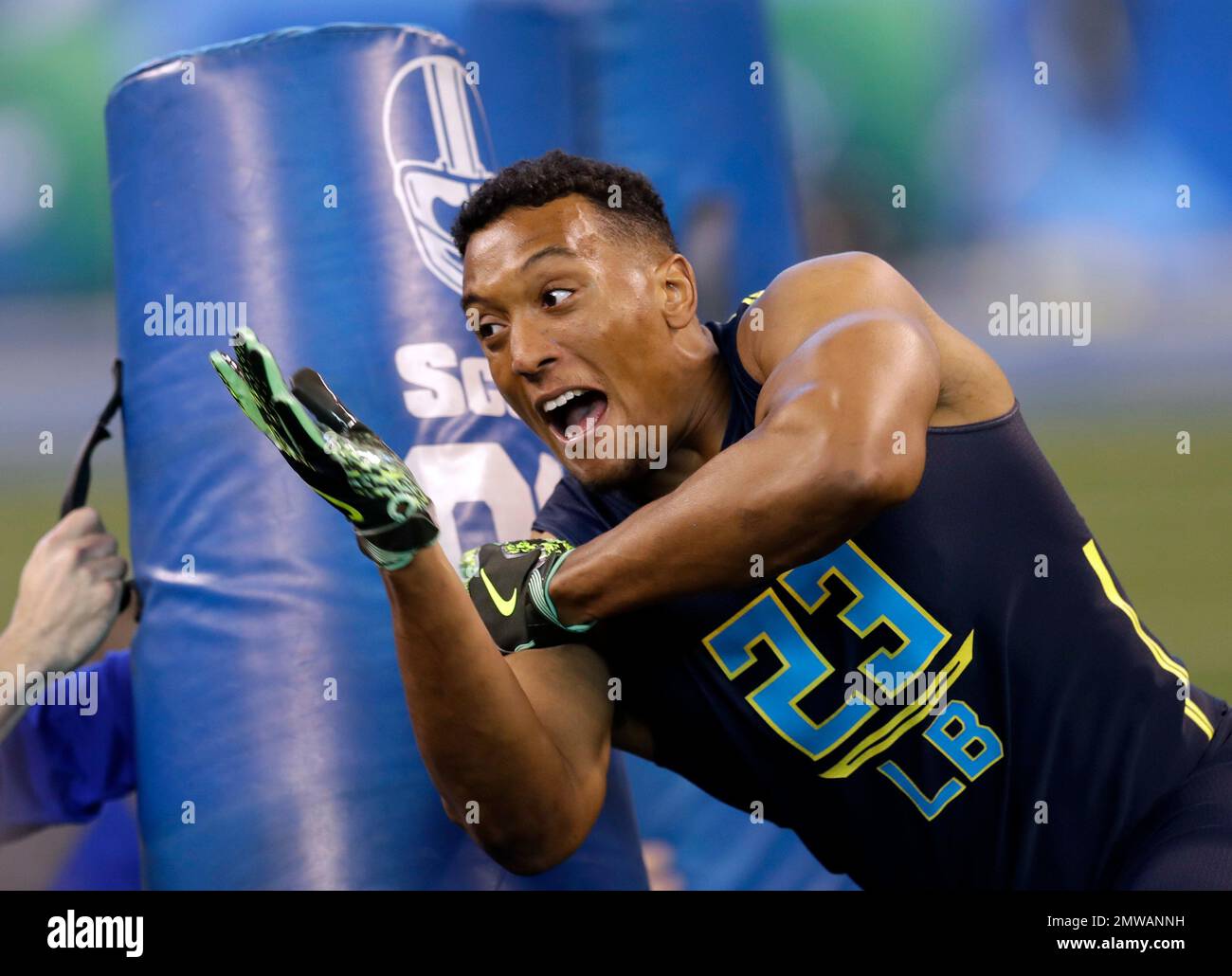 Illinois linebacker Hardy Nickerson runs a drill at the NFL football