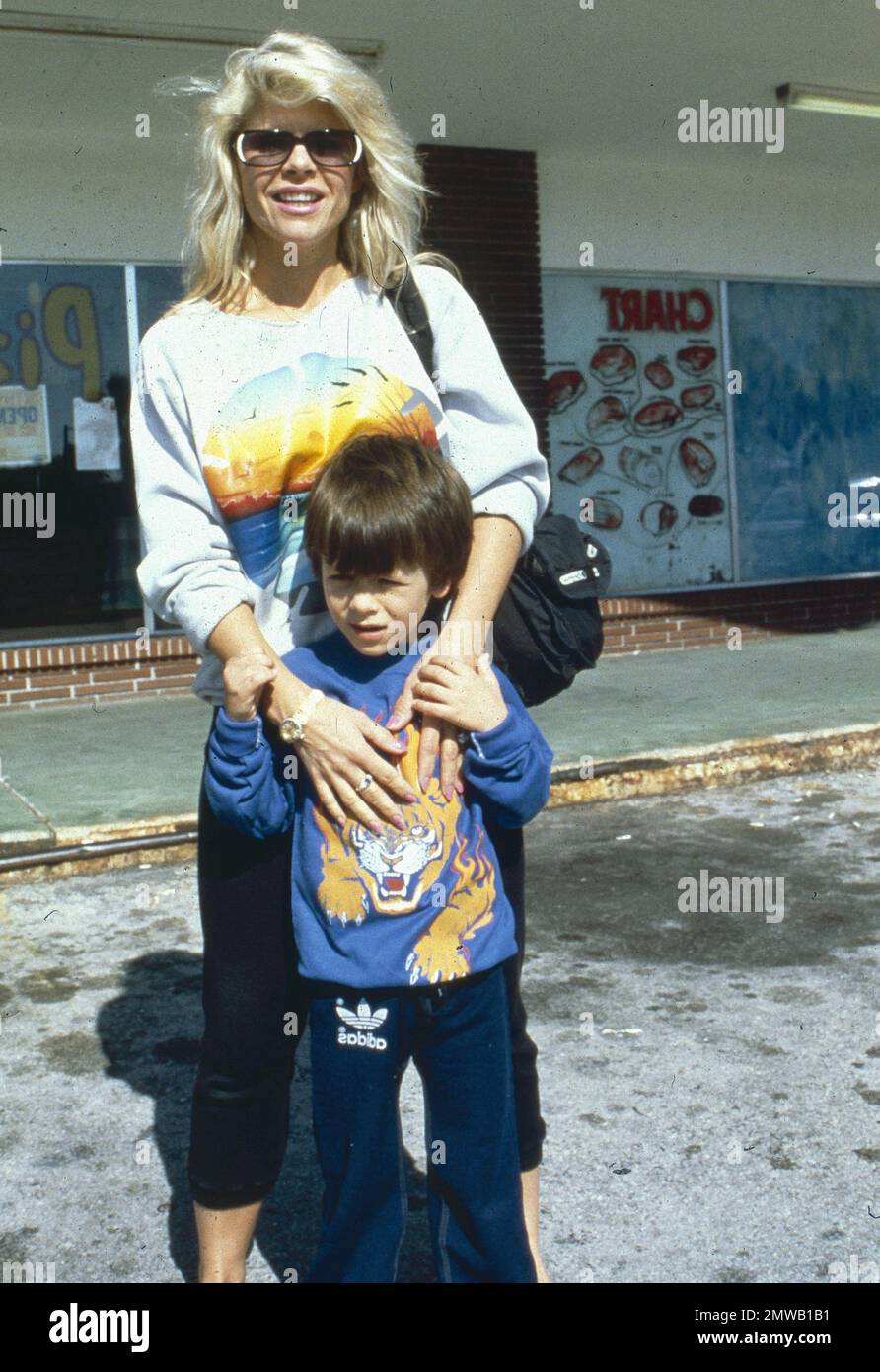 Los Angeles.CA.USA . Sasha Czack (then Sasha Stallone) with her son