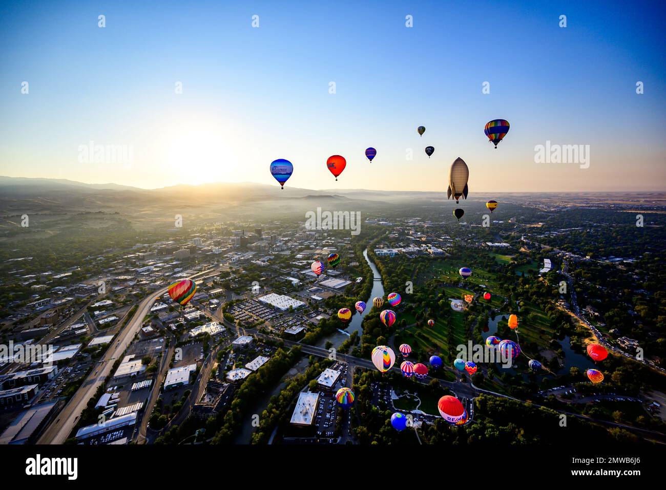 The hot air balloons flying over the city during the Spirit of Boise