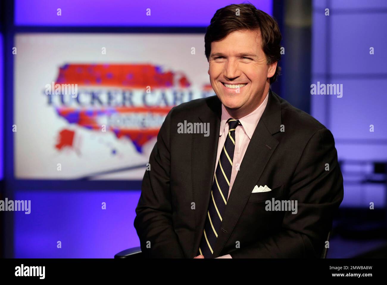 tucker-carlson-host-of-tucker-carlson-tonight-poses-for-photos-in-a