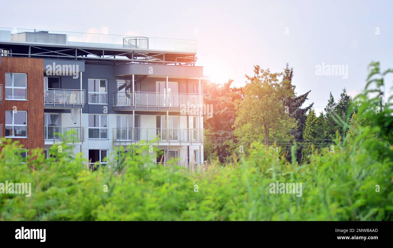 View of Modern residential building with new apartments in a green residential ...