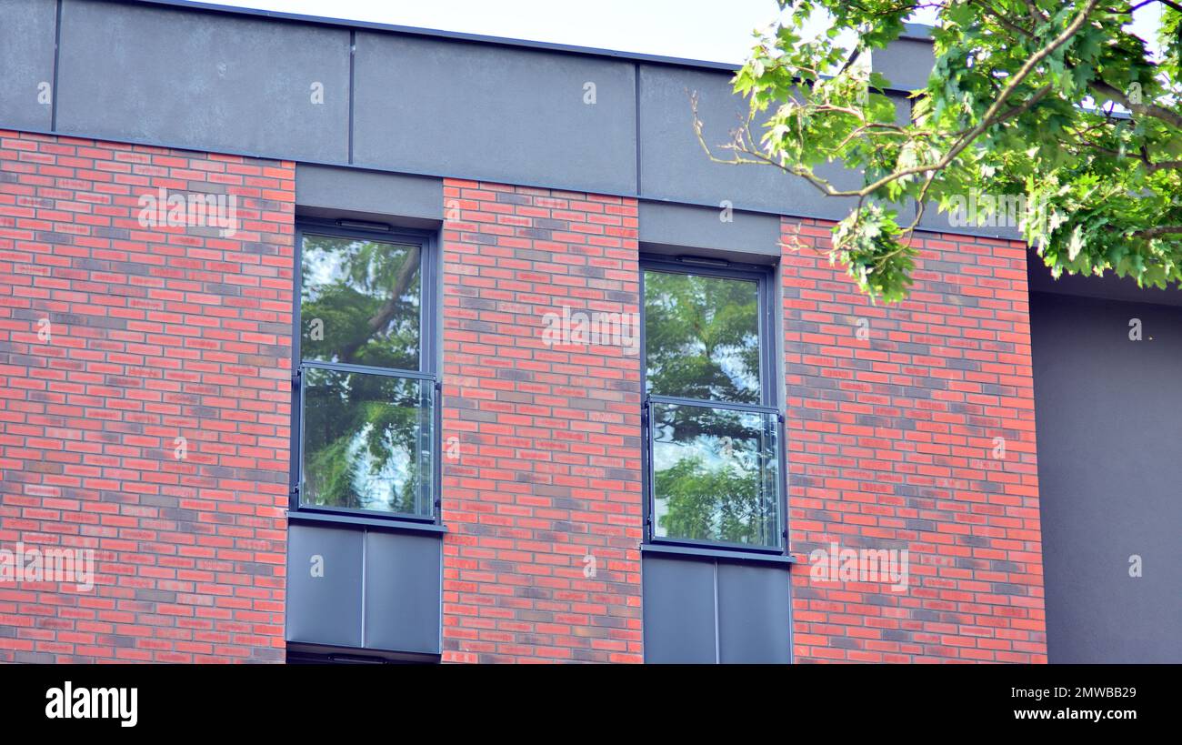 Modern residential building with new apartments in a green residential ...