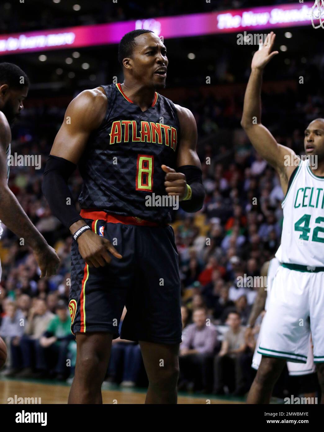 Atlanta Hawks center Dwight Howard (8) pumps his fist after a basket  against the Cleveland Cavaliers in the first half of a preseason NBA  basketball game, Monday, Oct. 10, 2016, in Atlanta. (