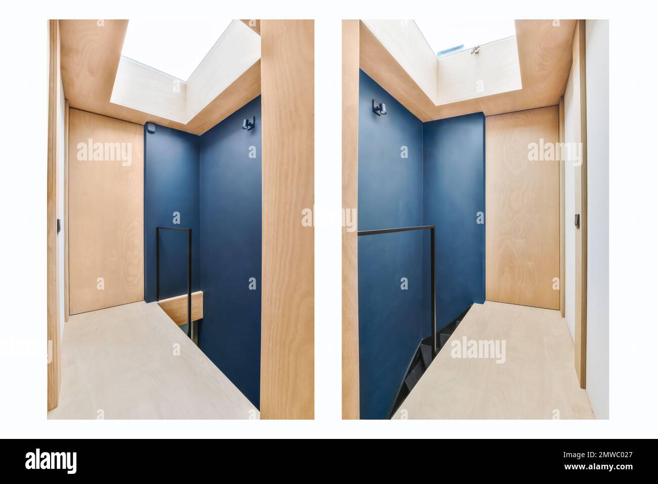 two doors, one open and the other closed with light wood paneling on both sides there is a blue skylight in the Stock Photo