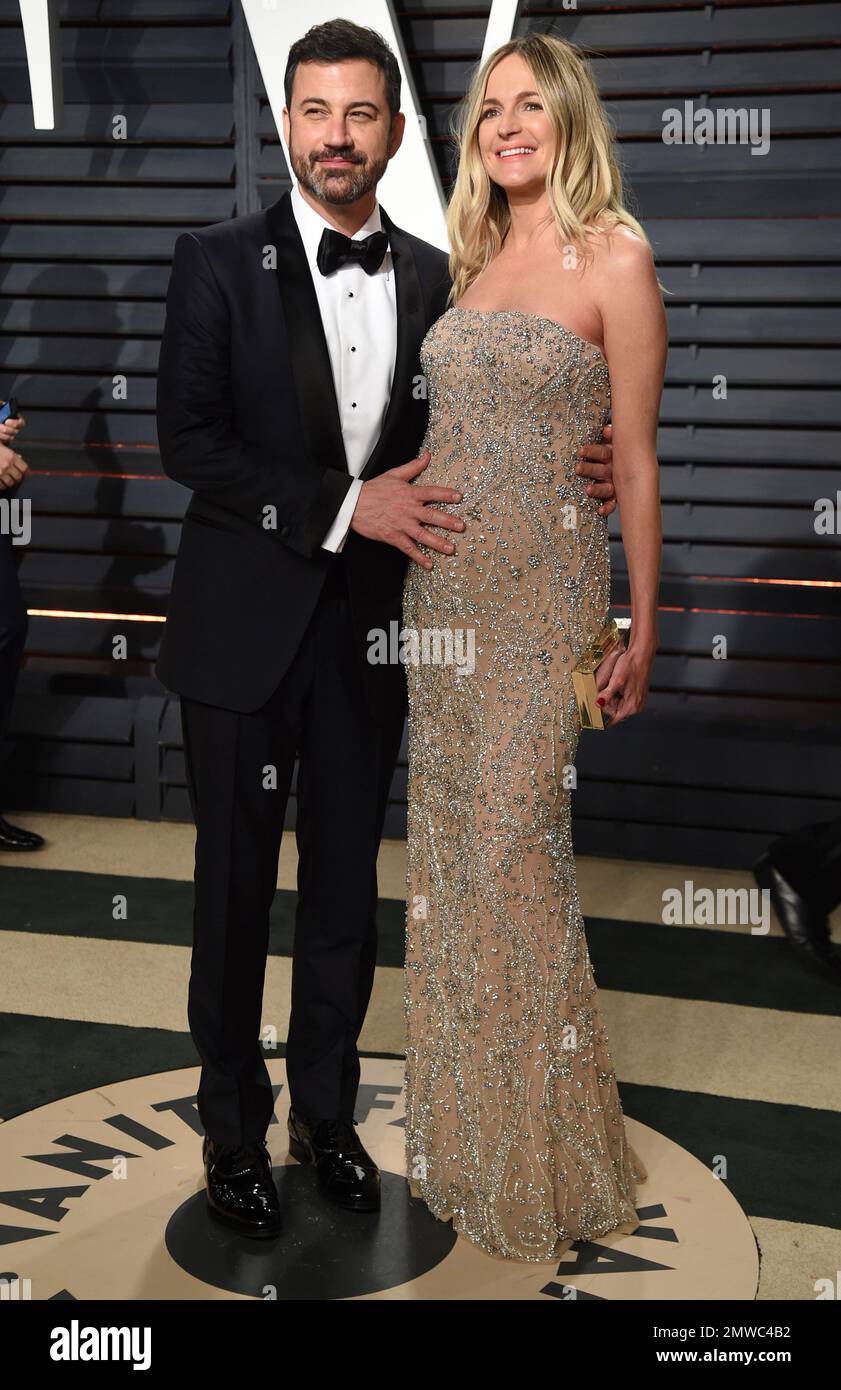 Jimmy Kimmel, left, and Molly McNearney arrive at the Vanity Fair Oscar