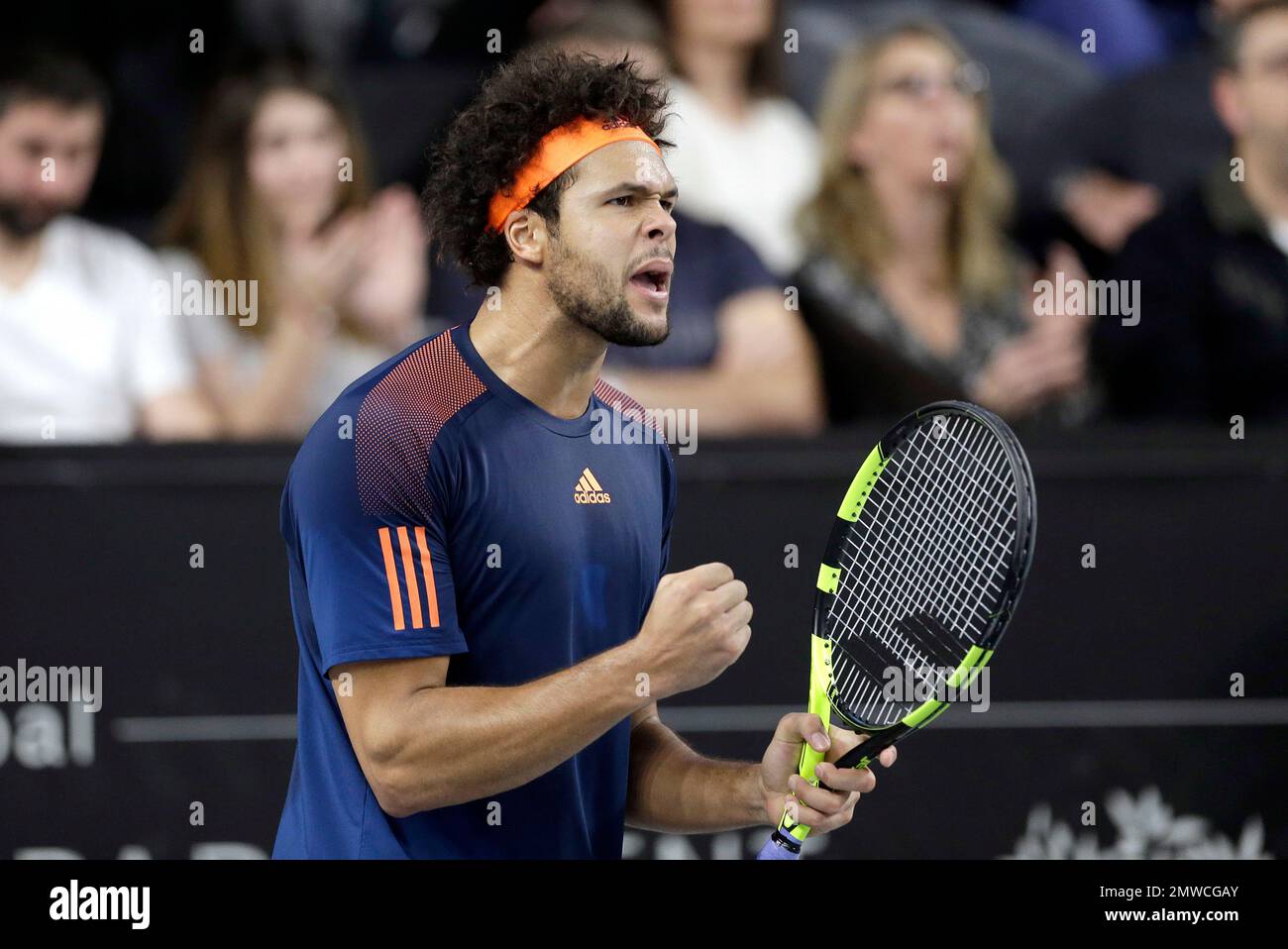 Jo-Wilfried Tsonga of France reacts after after winning a point against Lucas Pouille of France, during their final match at the Open 13 Provence tennis tournament, in Marseille, southern France, Sunday Feb.26,