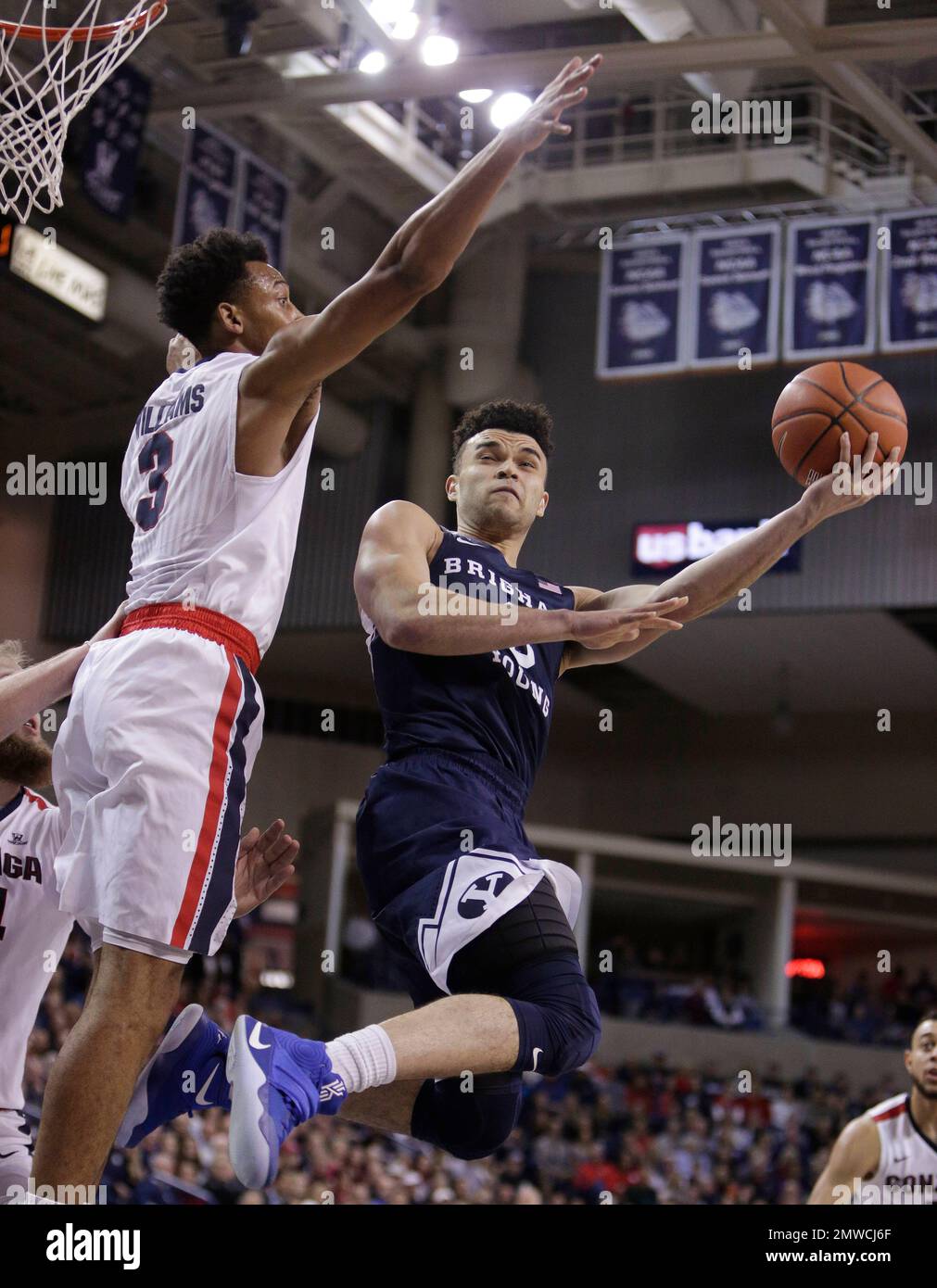 BYU guard Elijah Bryant, right, shoots against Gonzaga forward