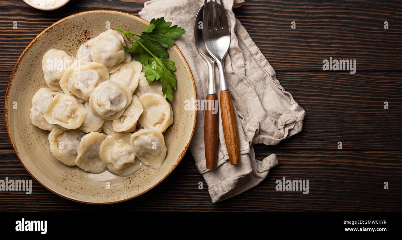 Pelmeni, traditional dish of Russian cuisine, boiled dumplings with