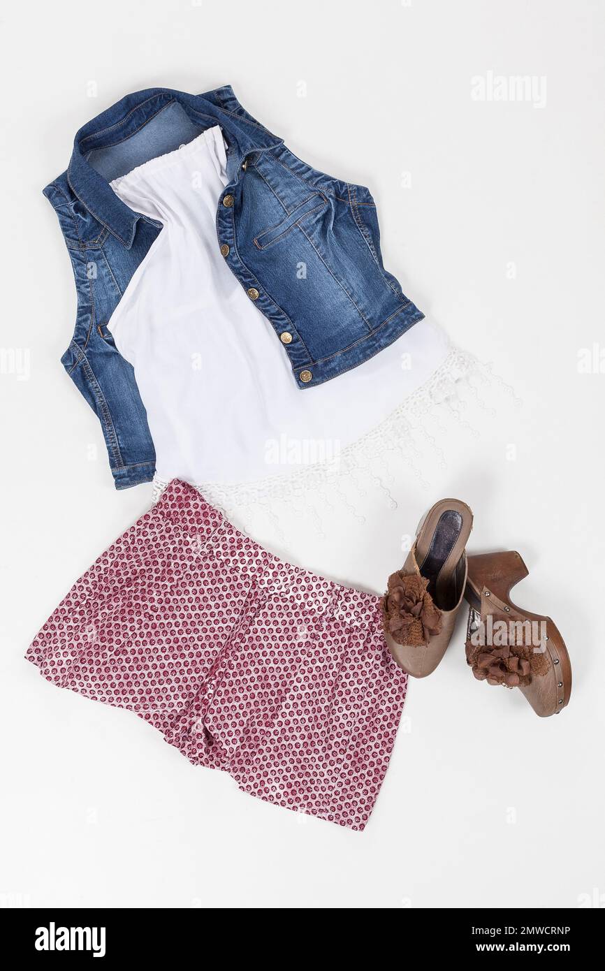Set Of Women Clothing; Blouse, Vest, Shorts And Shoes On White Background Stock Photo Alamy