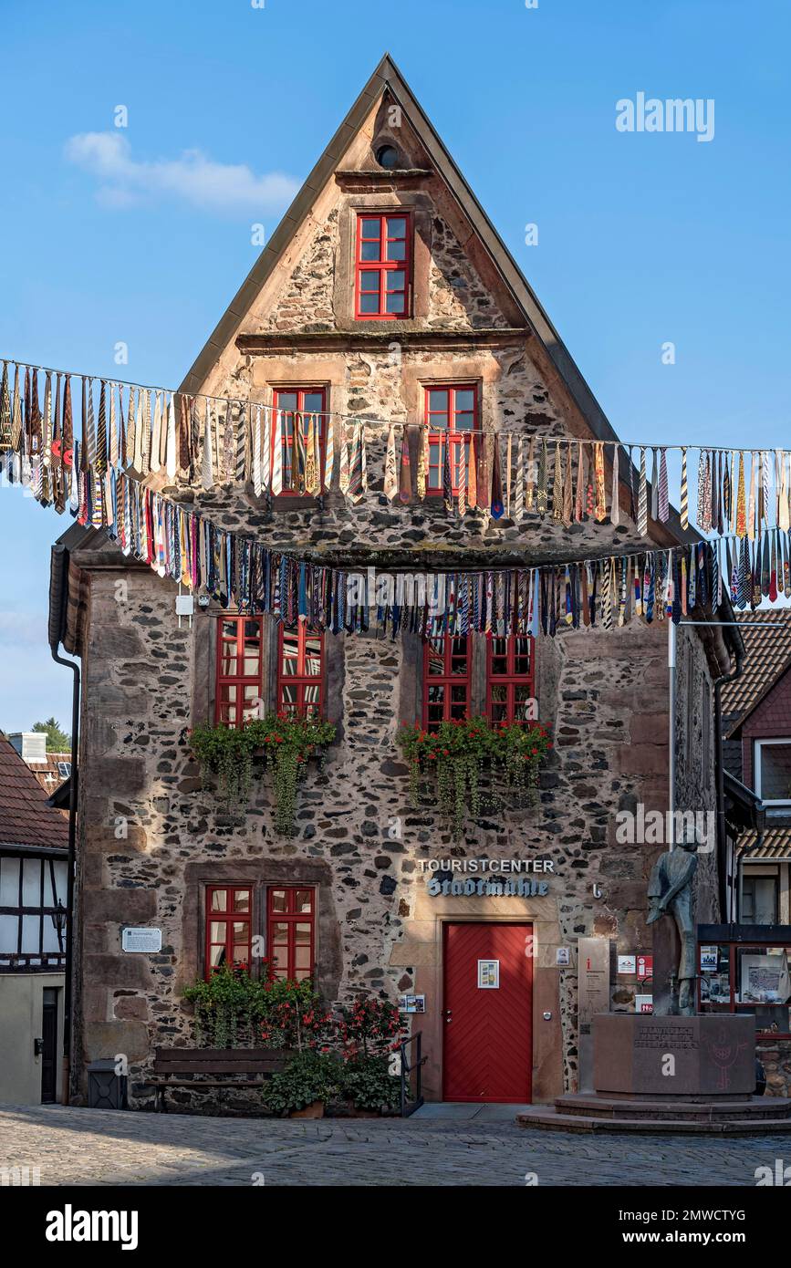 Hanging ties of an action for peace by Soroptimist International, SI, Never again war, town mill with stocking monument, old town, Lauterbach Stock Photo